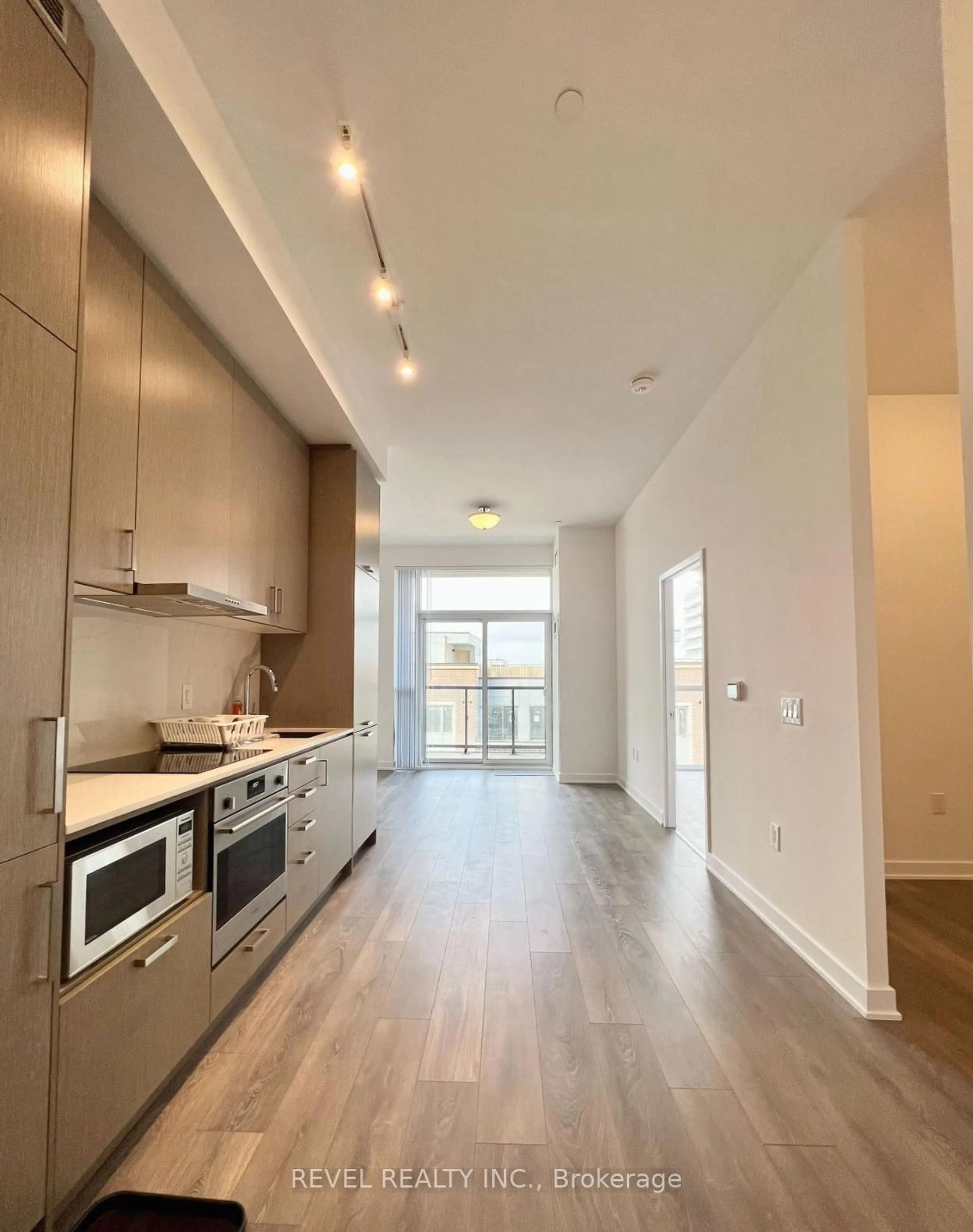 Open concept kitchen, wood/laminate floor for 60 Honeycrisp Cres #302, Vaughan Ontario L4K 0N5