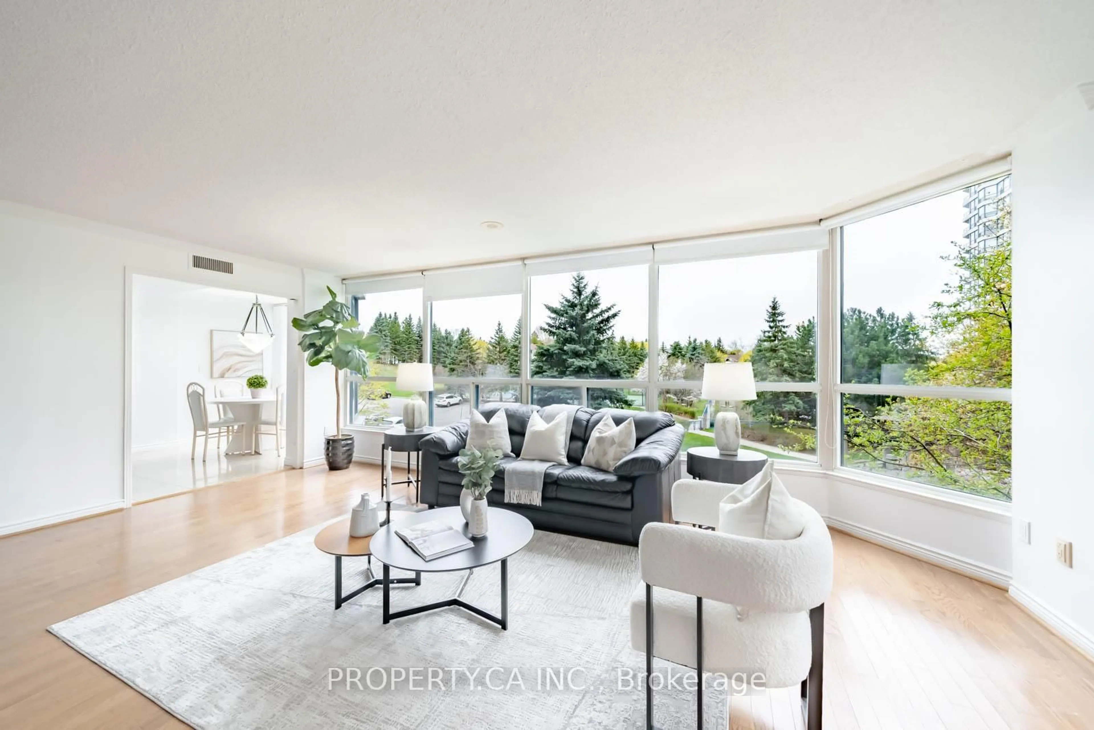 Living room with furniture, floor is not visible for 7300 Yonge St #301, Vaughan Ontario L4J 7Y5