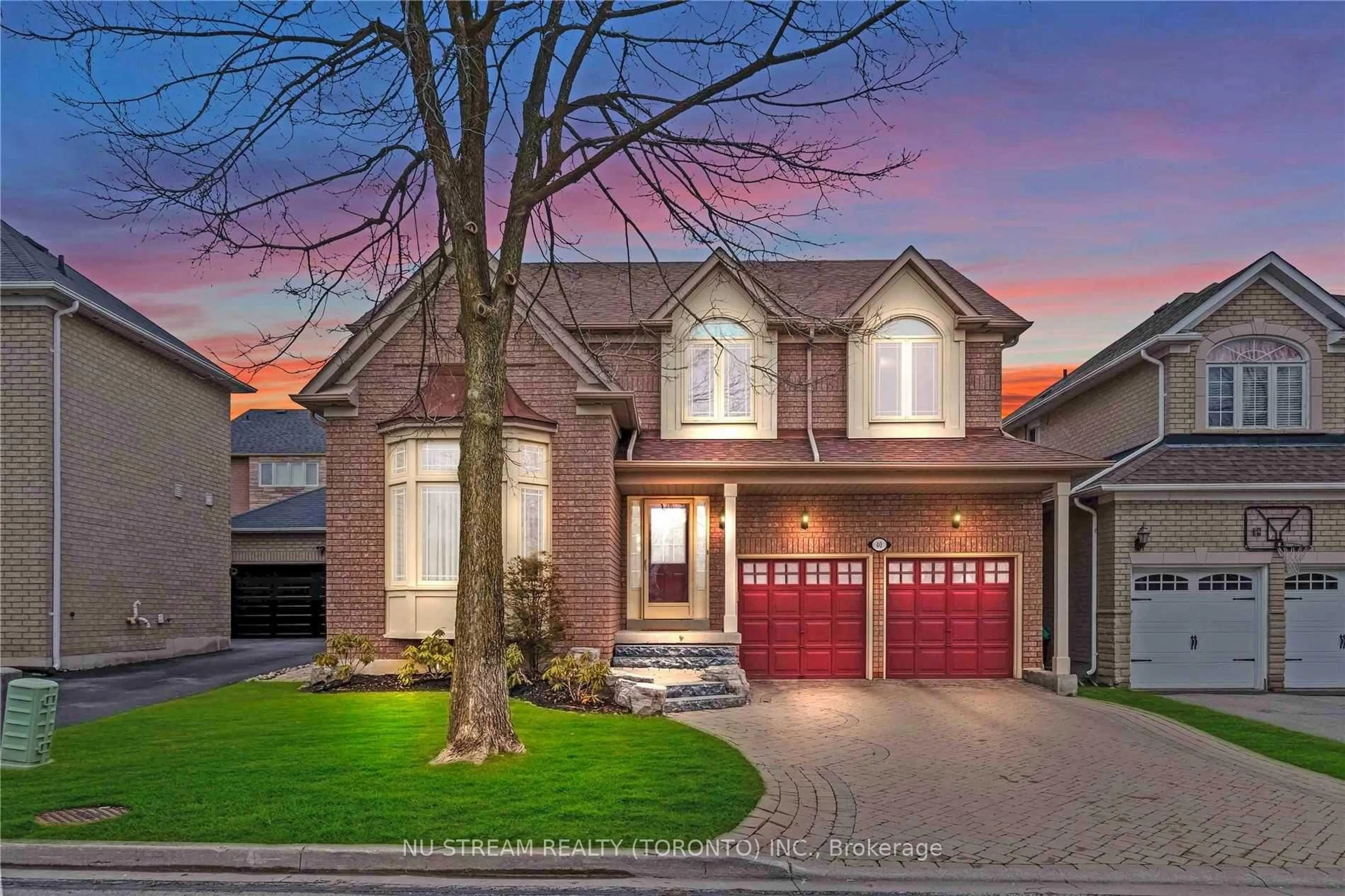 Home with brick exterior material, street for 40 Primrose Path Cres, Markham Ontario L3S 4A9