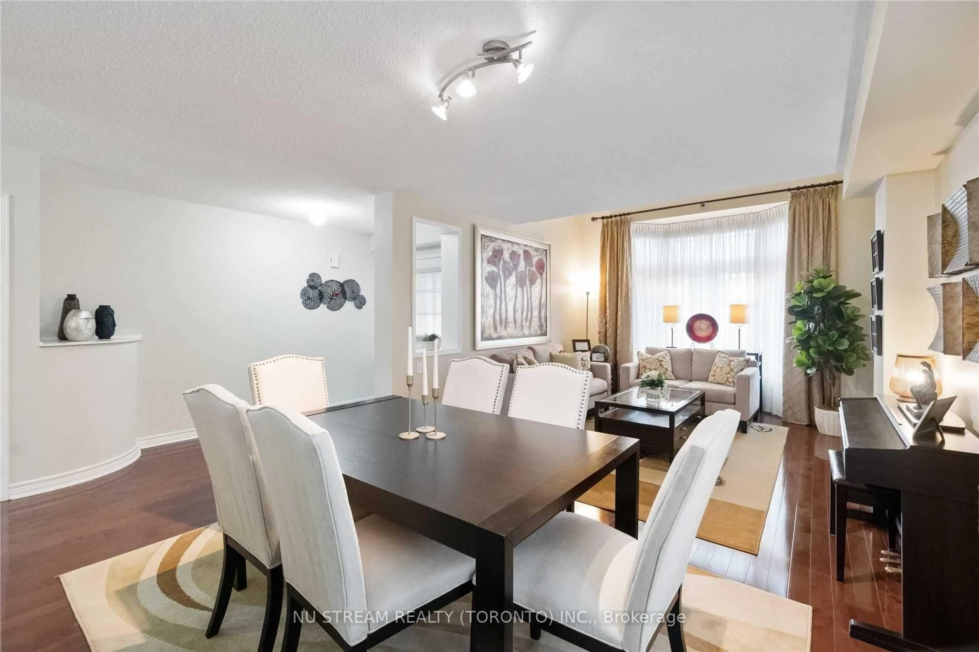 Dining room, wood/laminate floor for 40 Primrose Path Cres, Markham Ontario L3S 4A9