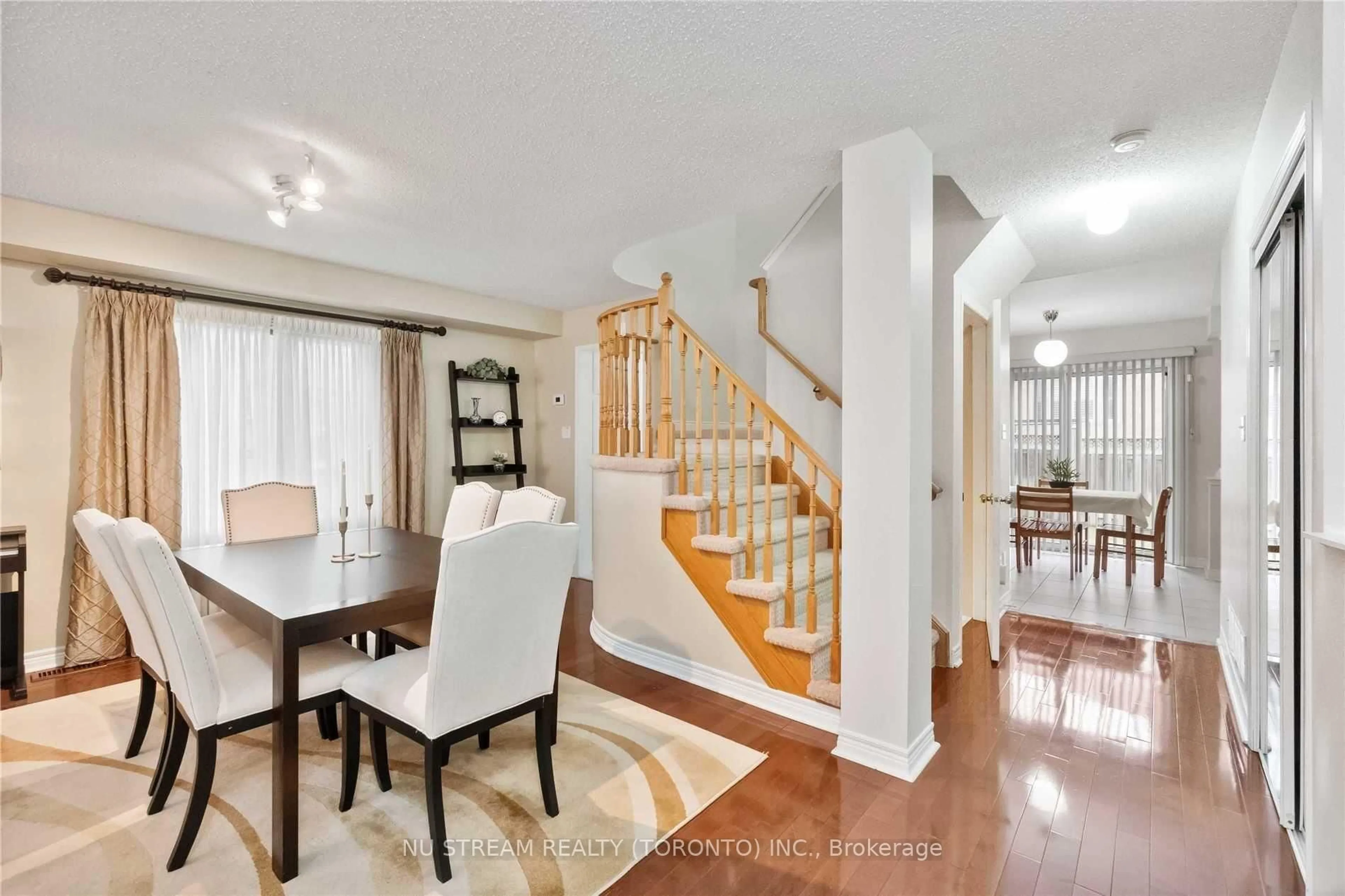 Dining room, wood/laminate floor for 40 Primrose Path Cres, Markham Ontario L3S 4A9