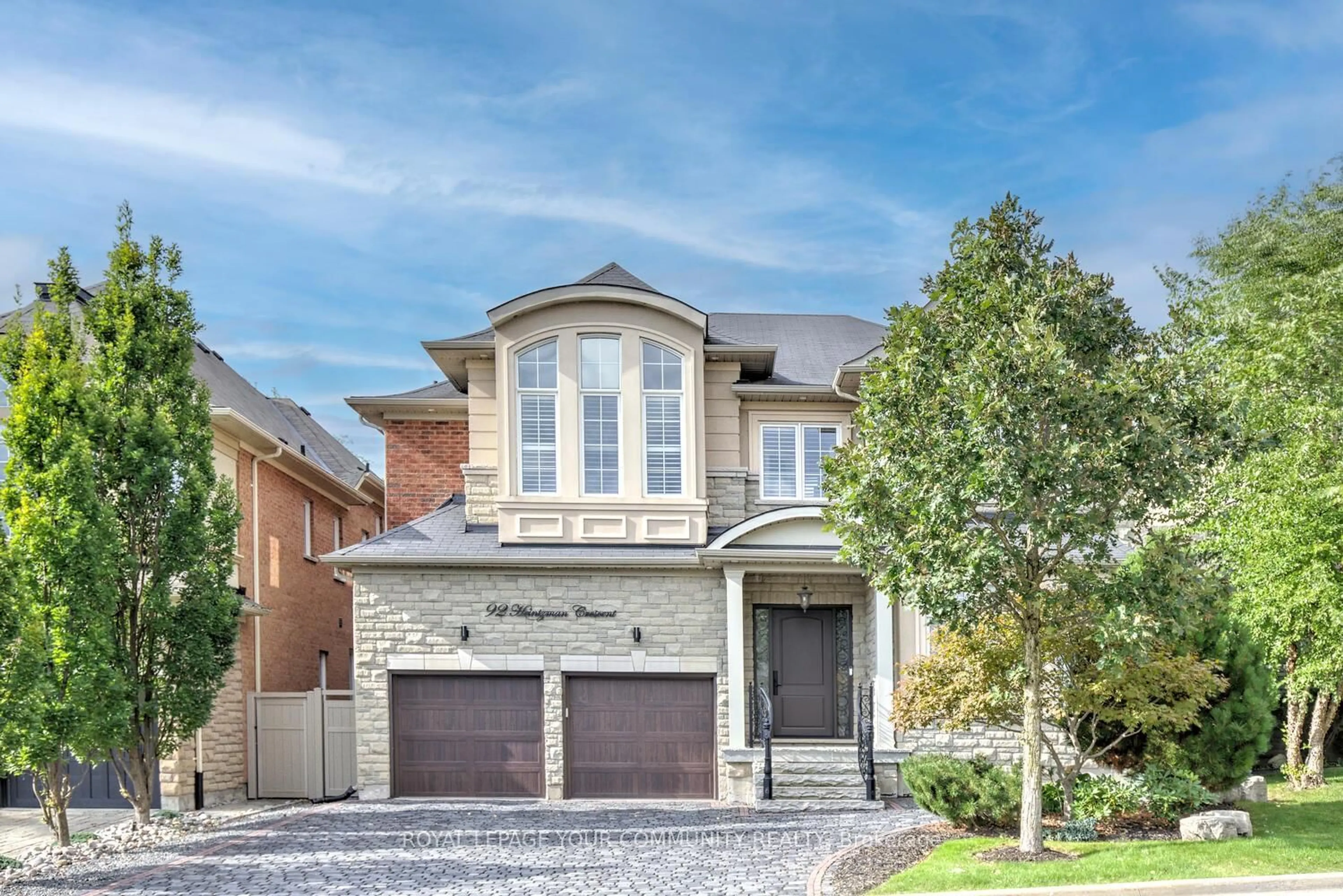 Home with brick exterior material, street for 92 Heintzman Cres, Vaughan Ontario L6A 4T1