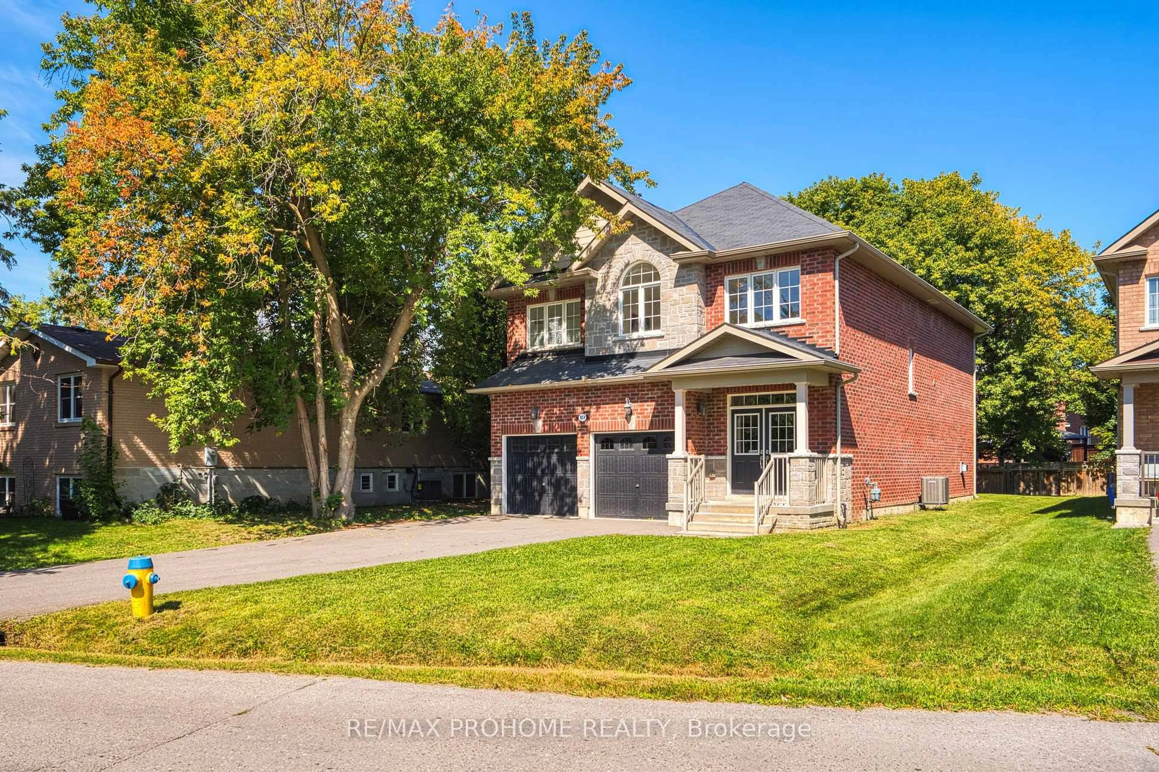 Home with brick exterior material, street for 102 Riveredge Dr, Georgina Ontario L4P 2P1