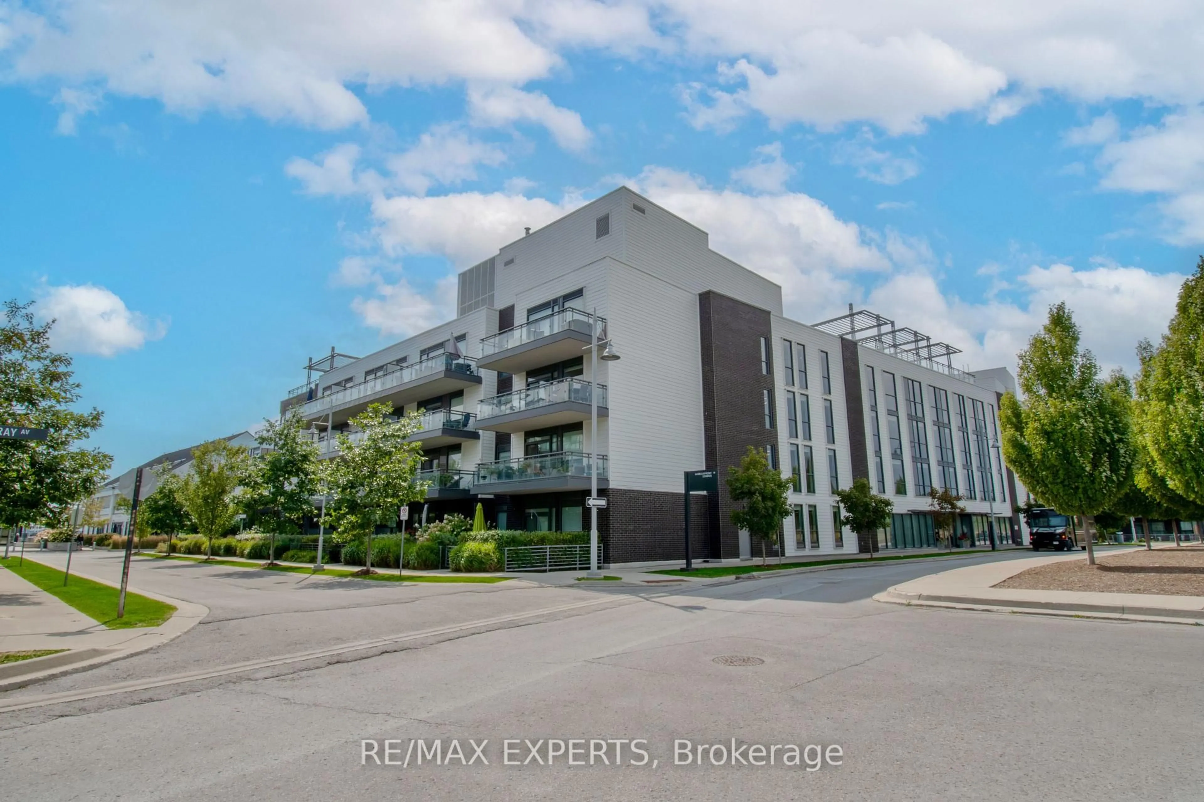 A pic from outside/outdoor area/front of a property/back of a property/a pic from drone, street for 301 Sea Ray Ave #C315, Innisfil Ontario L9S 0L8