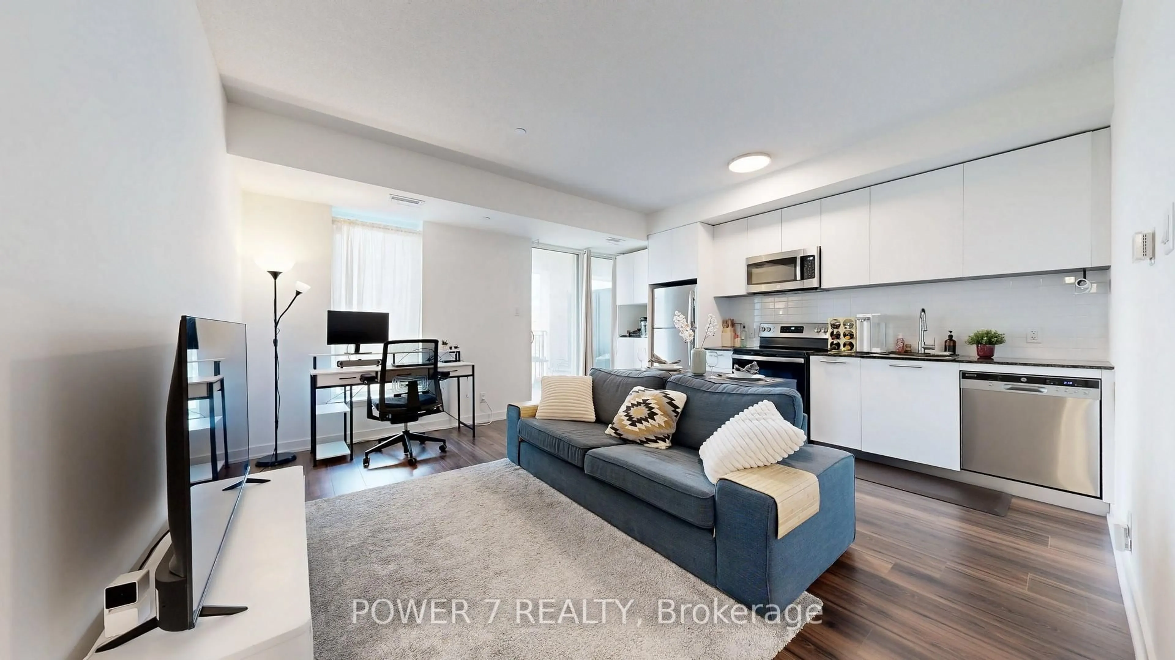 Living room with furniture, unknown for 101 Cathedral High St #337, Markham Ontario L6C 3L8