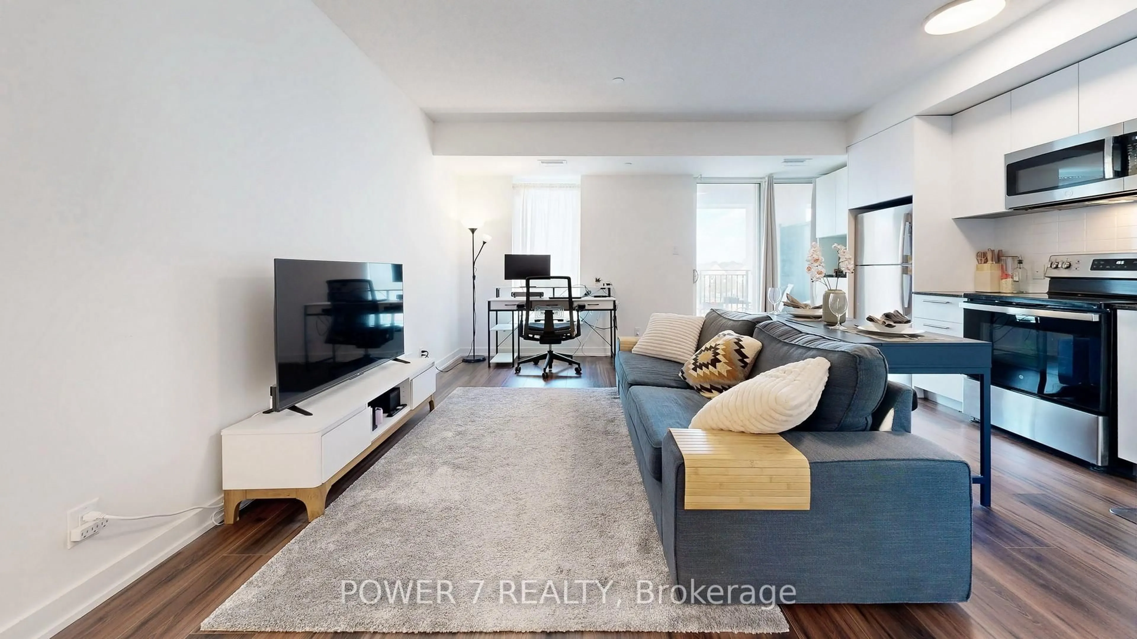 Living room with furniture, unknown for 101 Cathedral High St #337, Markham Ontario L6C 3L8