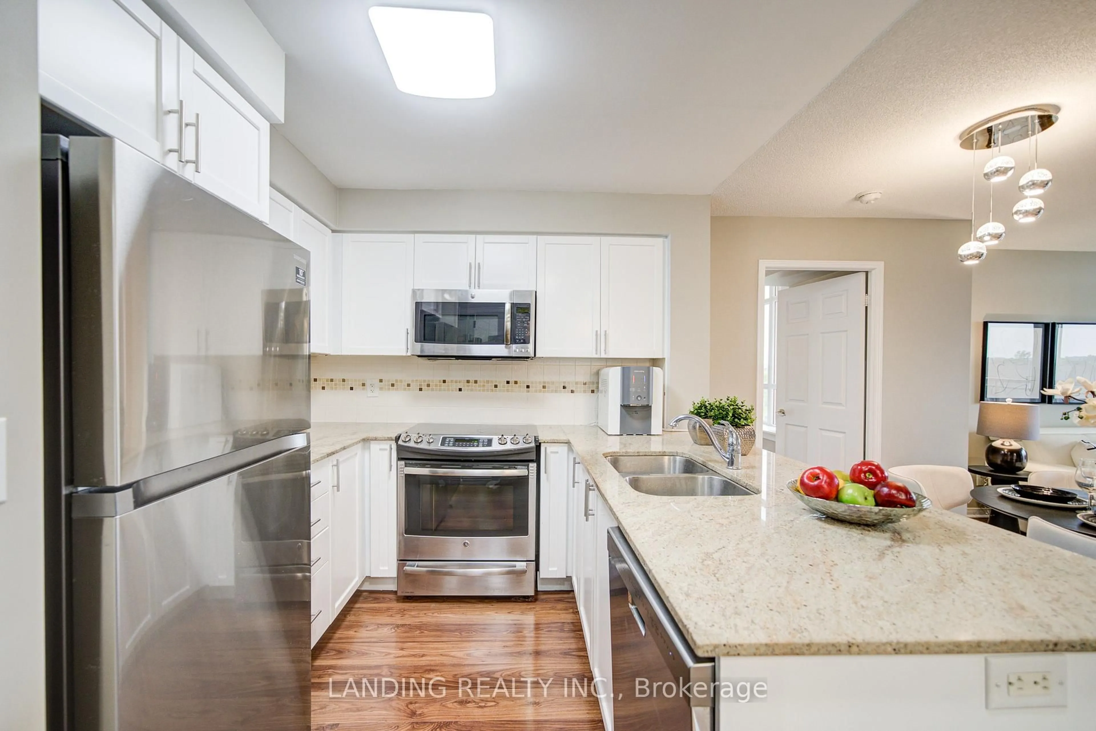 Open concept kitchen, ceramic/tile floor for 75 King William Cres #411, Richmond Hill Ontario L4B 0C1