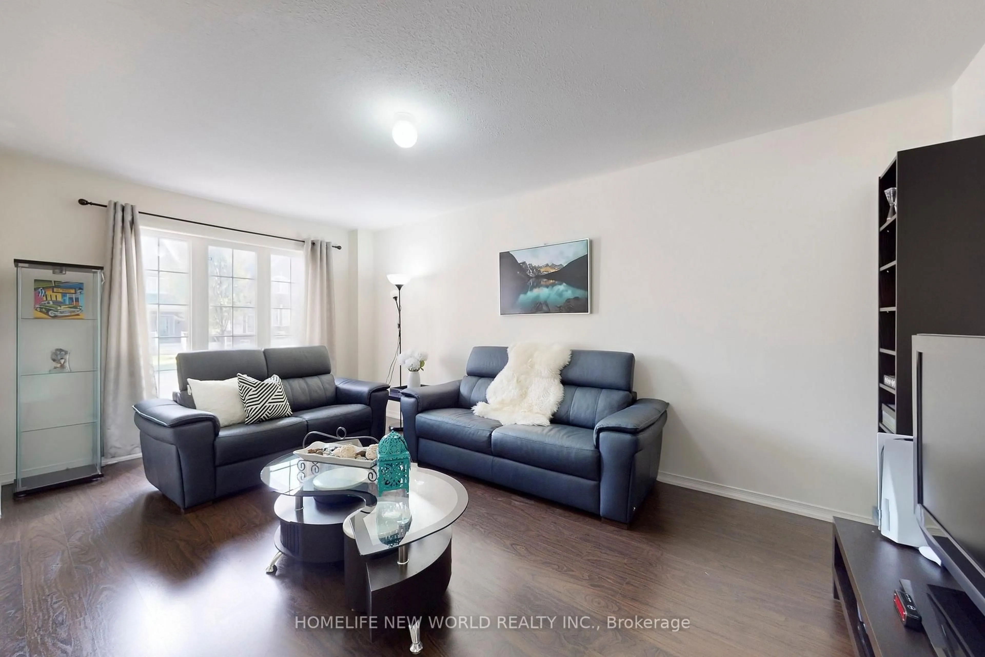 Living room with furniture, wood/laminate floor for 1124 BUR OAK Ave, Markham Ontario L6E 0K9