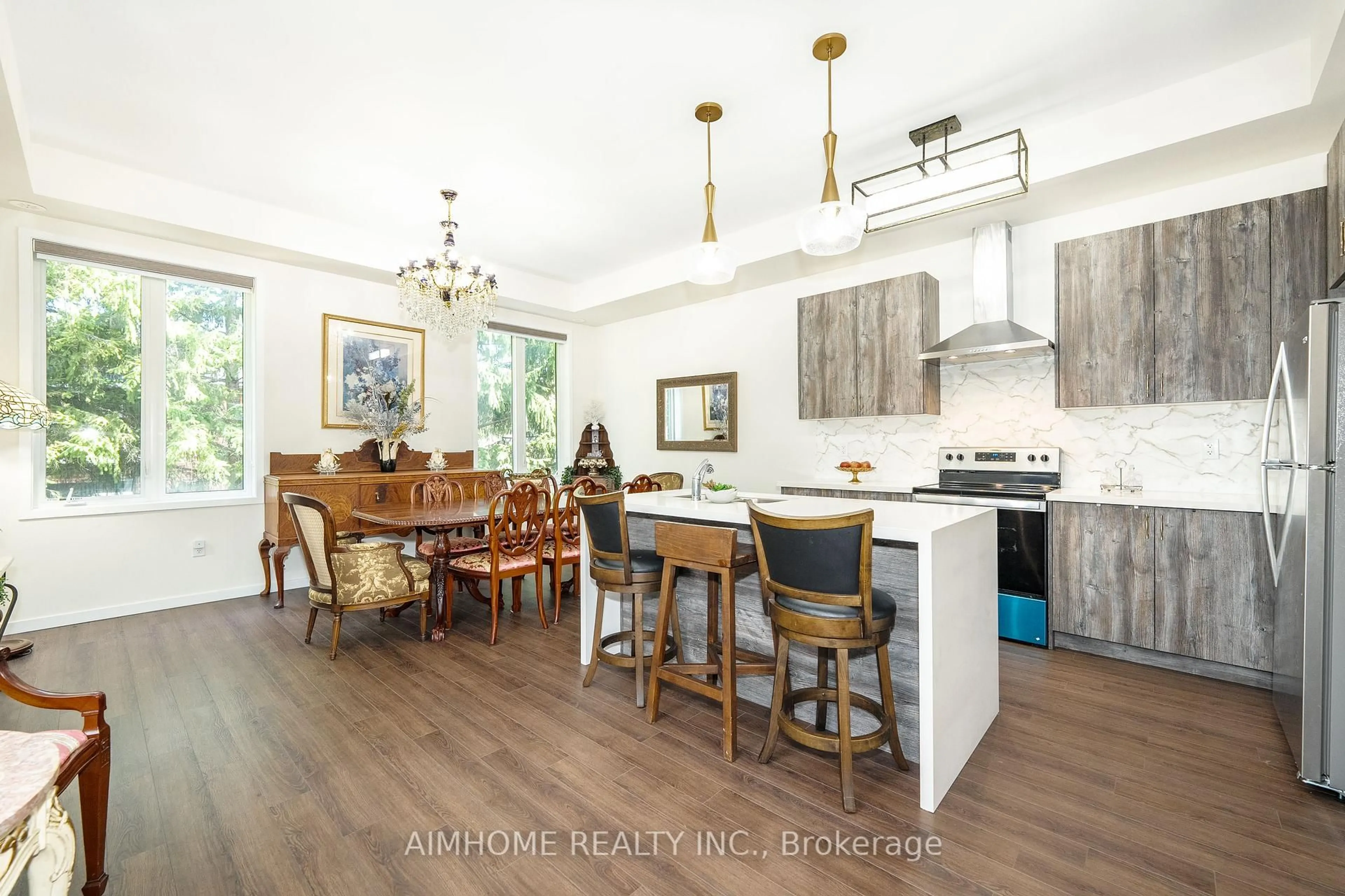 Open concept kitchen, wood/laminate floor for 13 Armillo Pl, Markham Ontario L6E 0V4