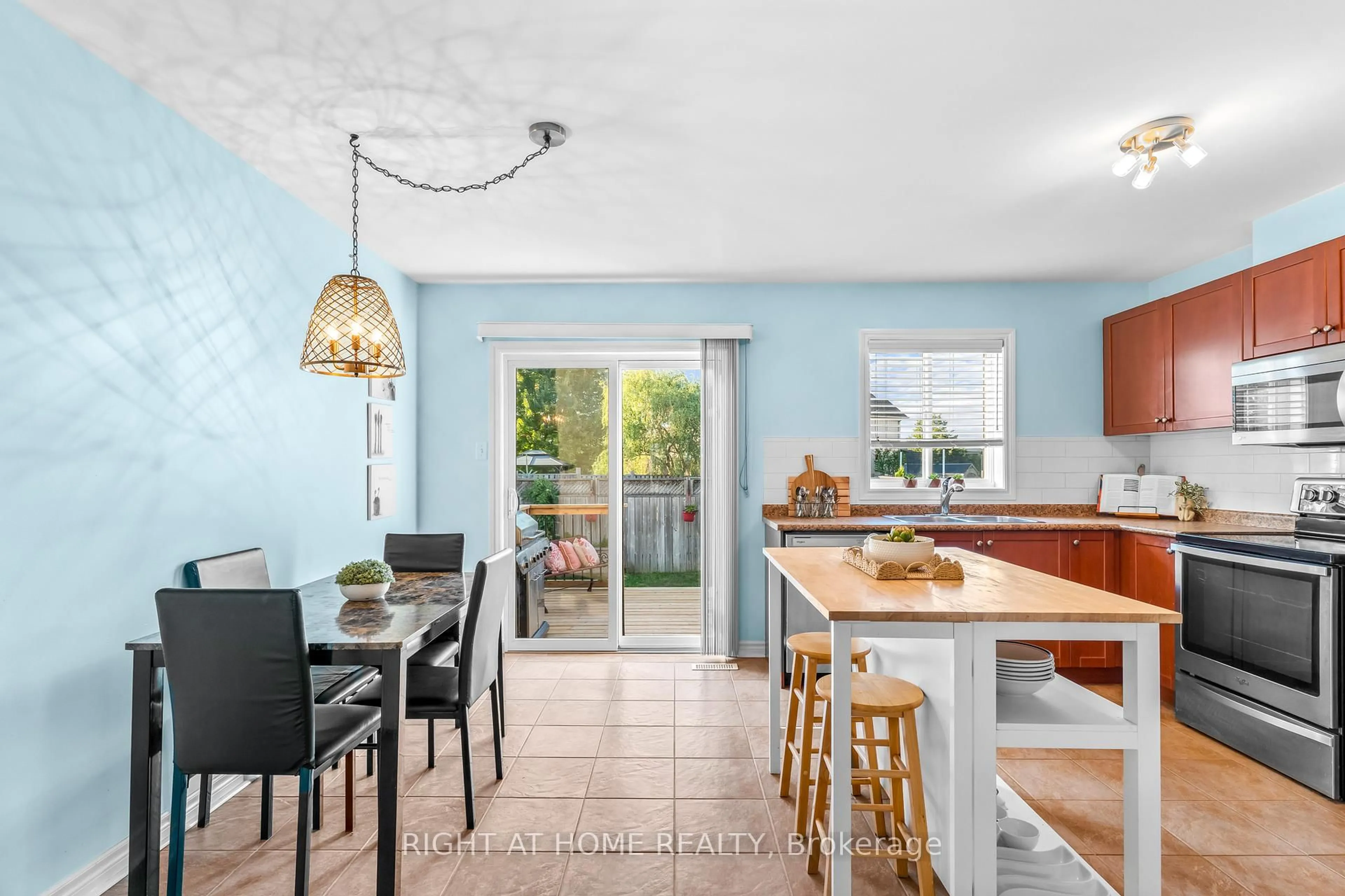 Open concept kitchen, ceramic/tile floor for 219 Banting Cres, Essa Ontario L3W 0P8