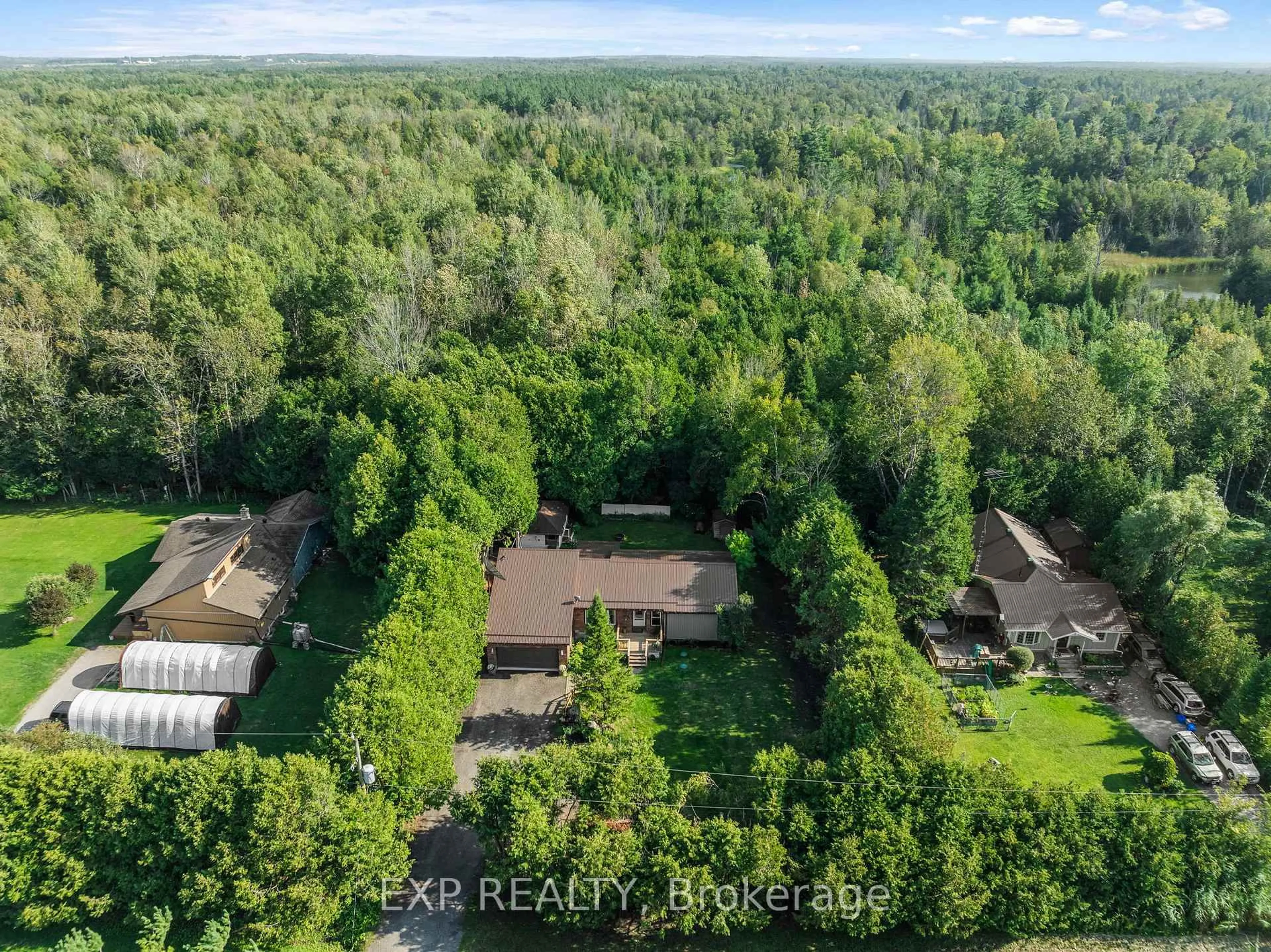A pic from outside/outdoor area/front of a property/back of a property/a pic from drone, forest/trees view for 15 Klimek Blvd, Georgina Ontario L0E 1L0
