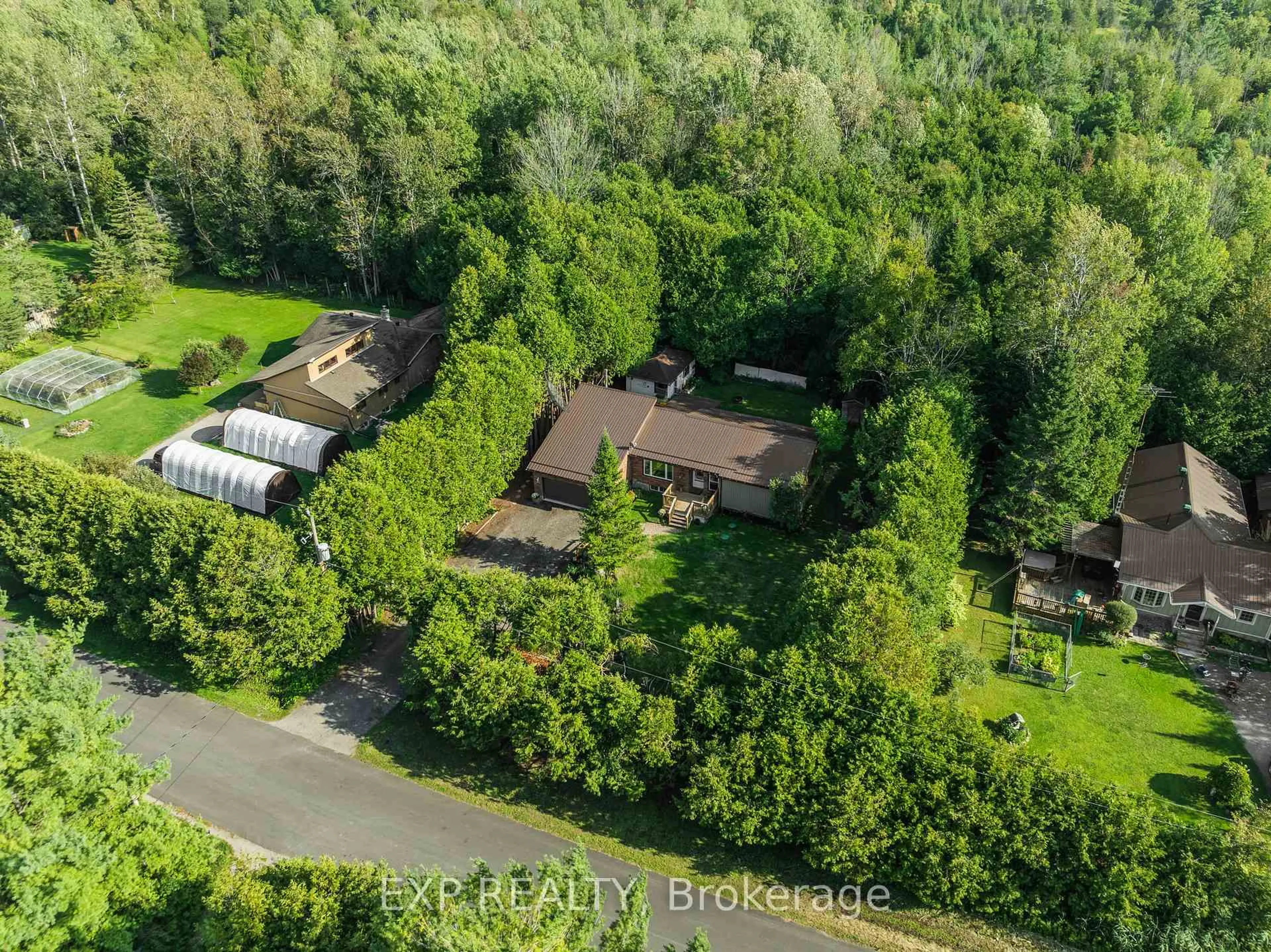 A pic from outside/outdoor area/front of a property/back of a property/a pic from drone, forest/trees view for 15 Klimek Blvd, Georgina Ontario L0E 1L0