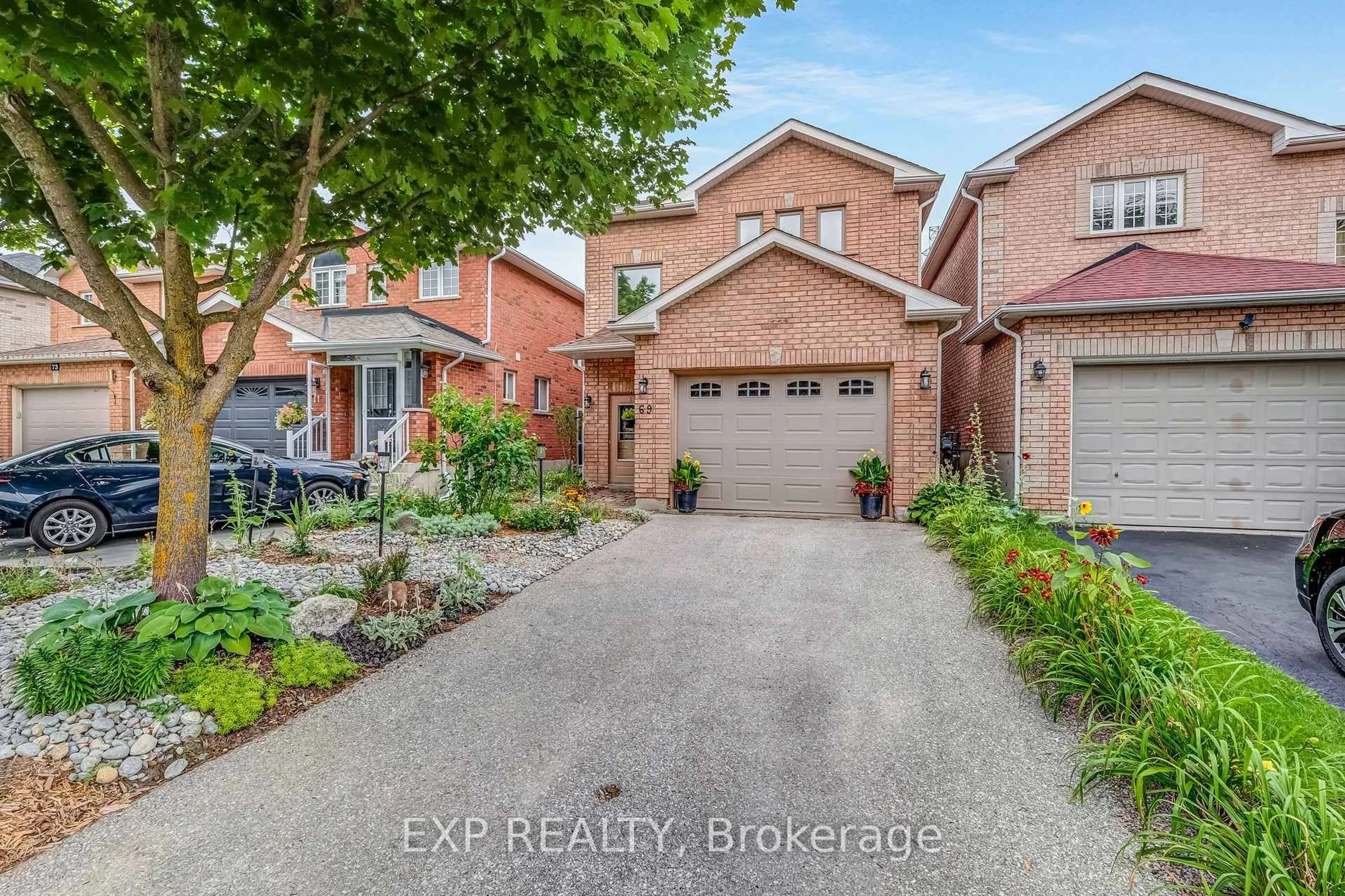 Home with brick exterior material, street for 69 Clearmeadow Blvd, Newmarket Ontario L3X 2M6