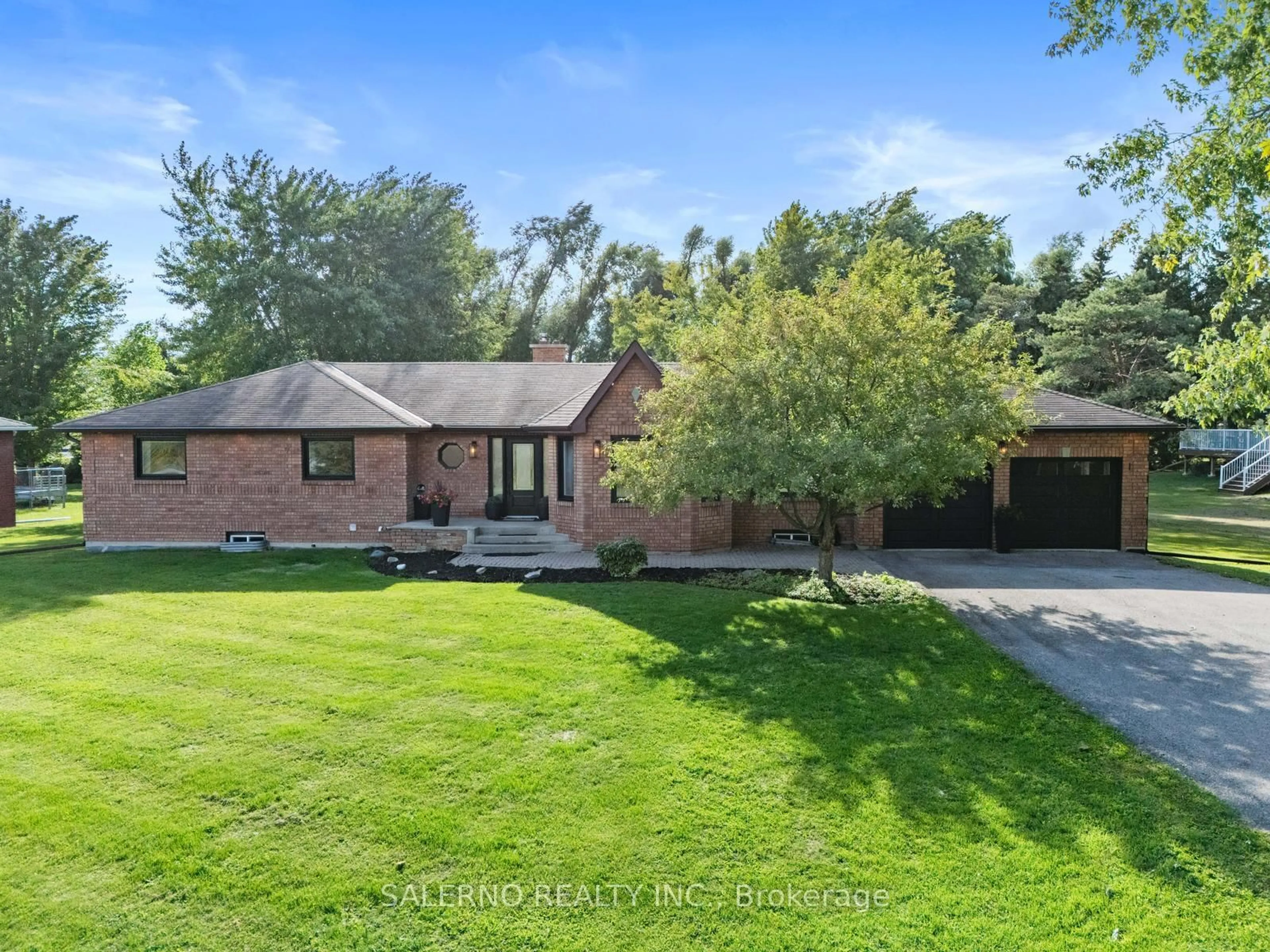 A pic from outside/outdoor area/front of a property/back of a property/a pic from drone, unknown for 4372 10th Sdrd, Bradford West Gwillimbury Ontario L3Z 3V3
