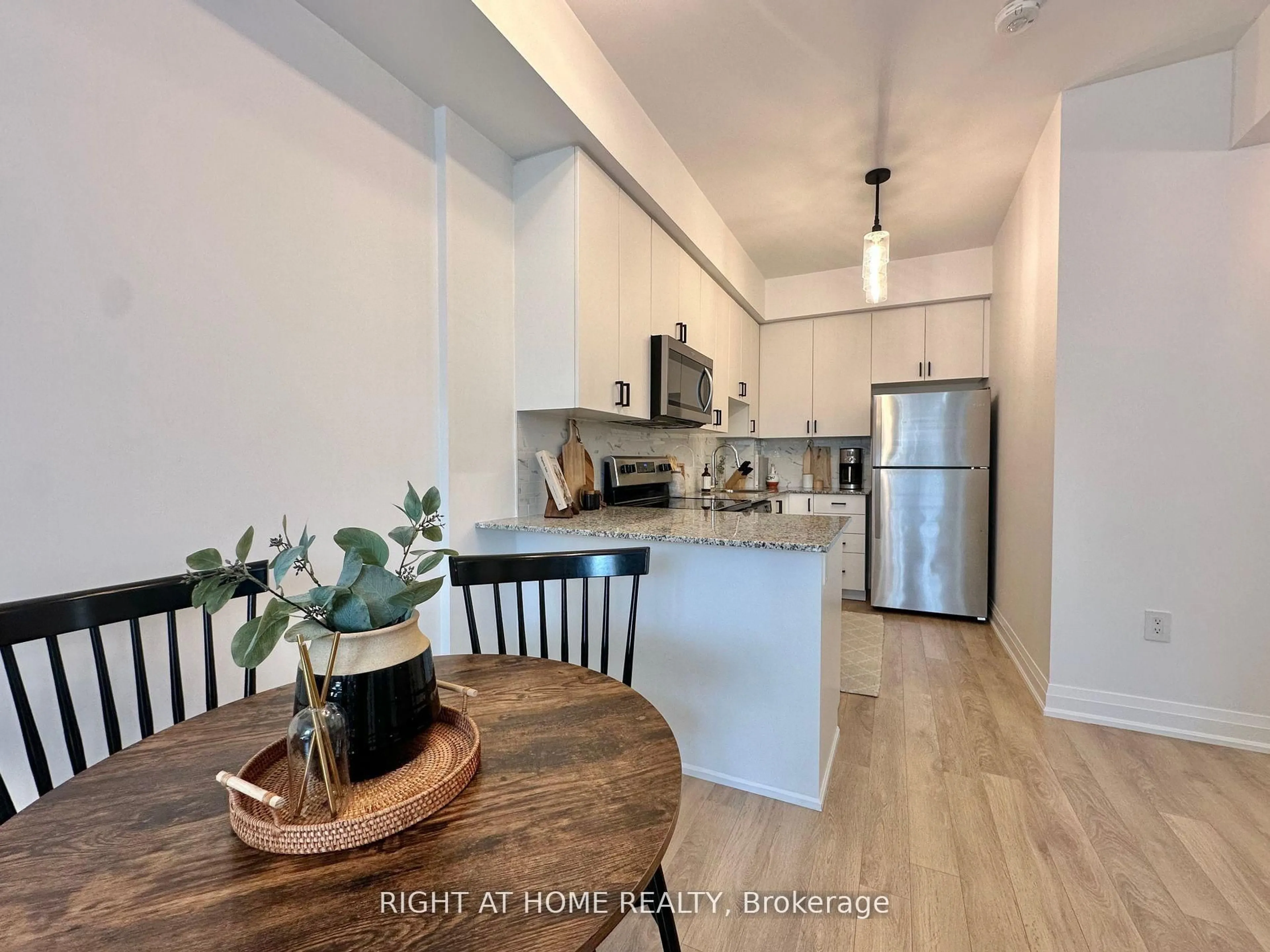 Open concept kitchen, wood/laminate floor for 5299 HWY 7 Highway #C801, Vaughan Ontario L4L 0J1