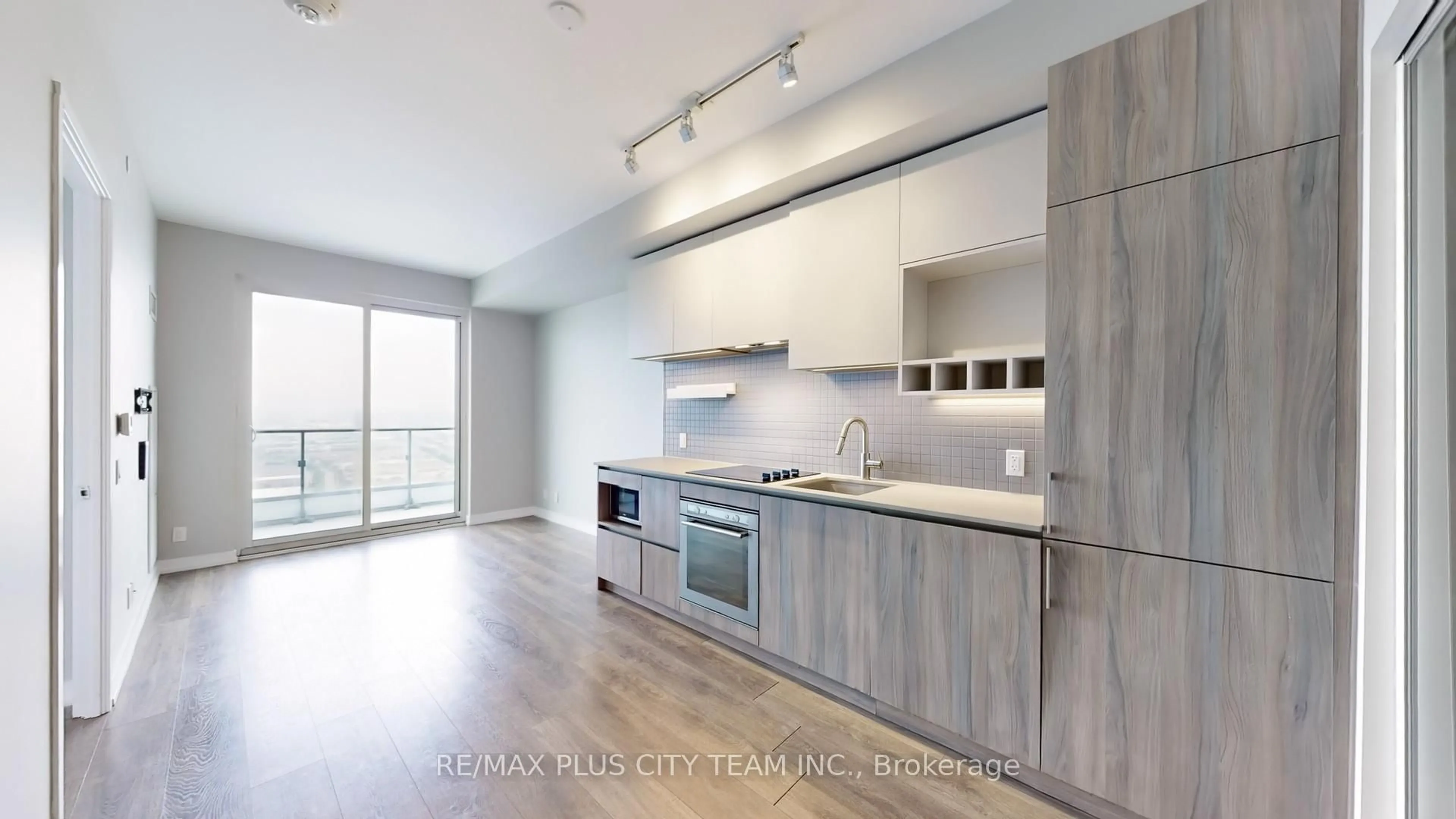 Open concept kitchen, wood/laminate floor for 950 Portage Pkwy #4215, Vaughan Ontario L4K 0J7