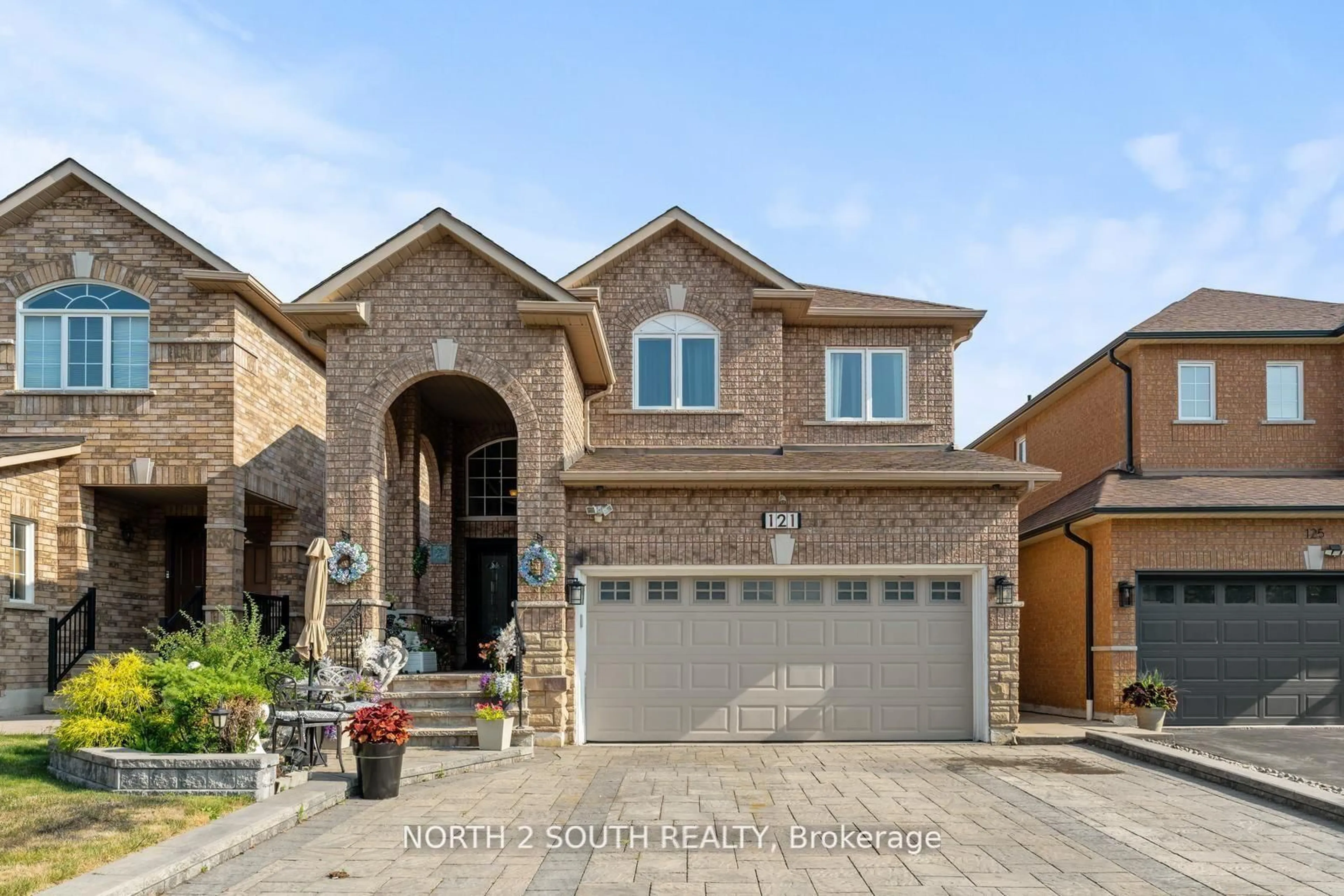 Home with brick exterior material, street for 121 Royal Pine Ave, Vaughan Ontario L4H 1S8
