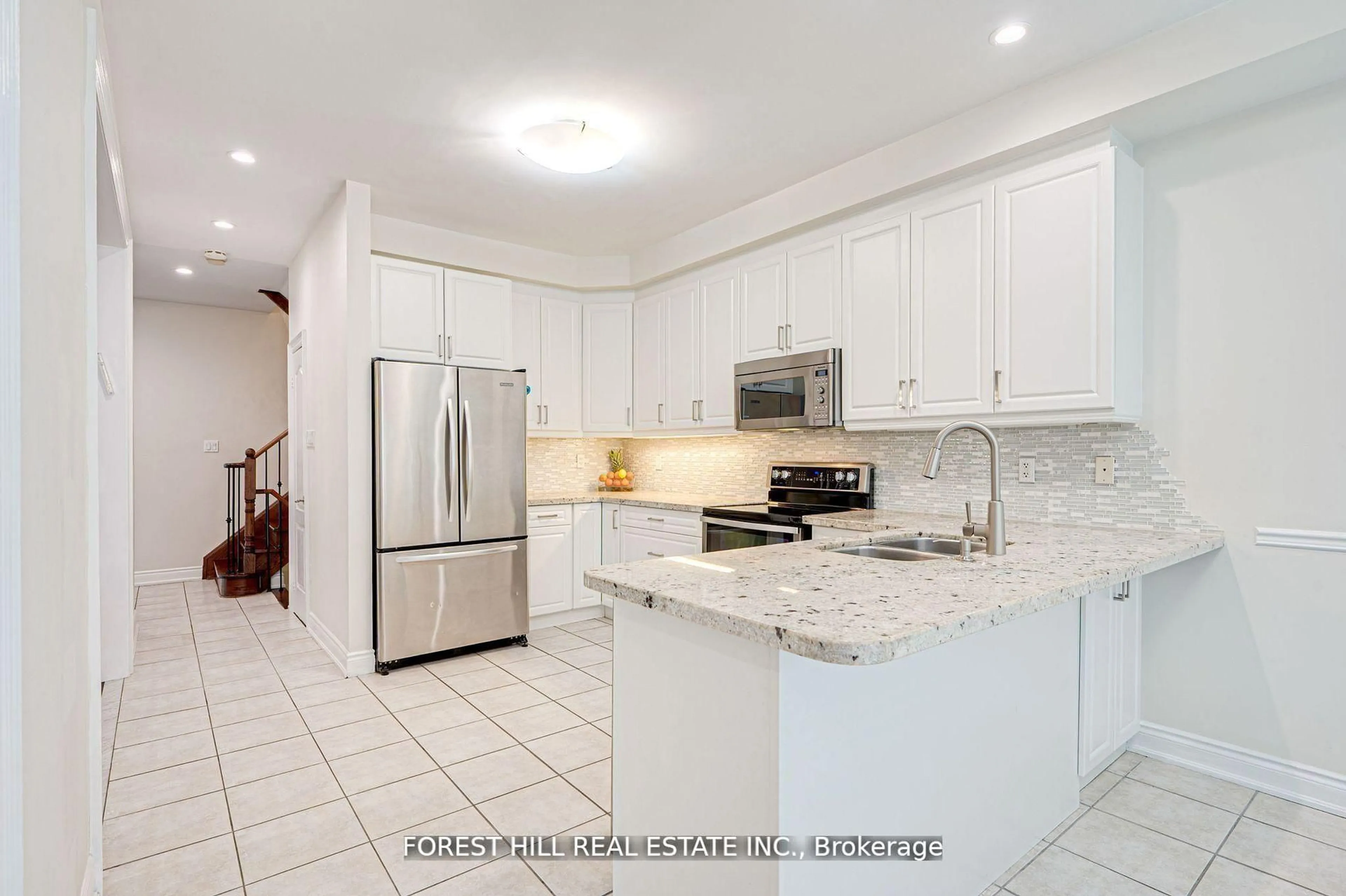 Open concept kitchen, ceramic/tile floor for 473 Apple Blossom Dr, Vaughan Ontario L4J 9K7