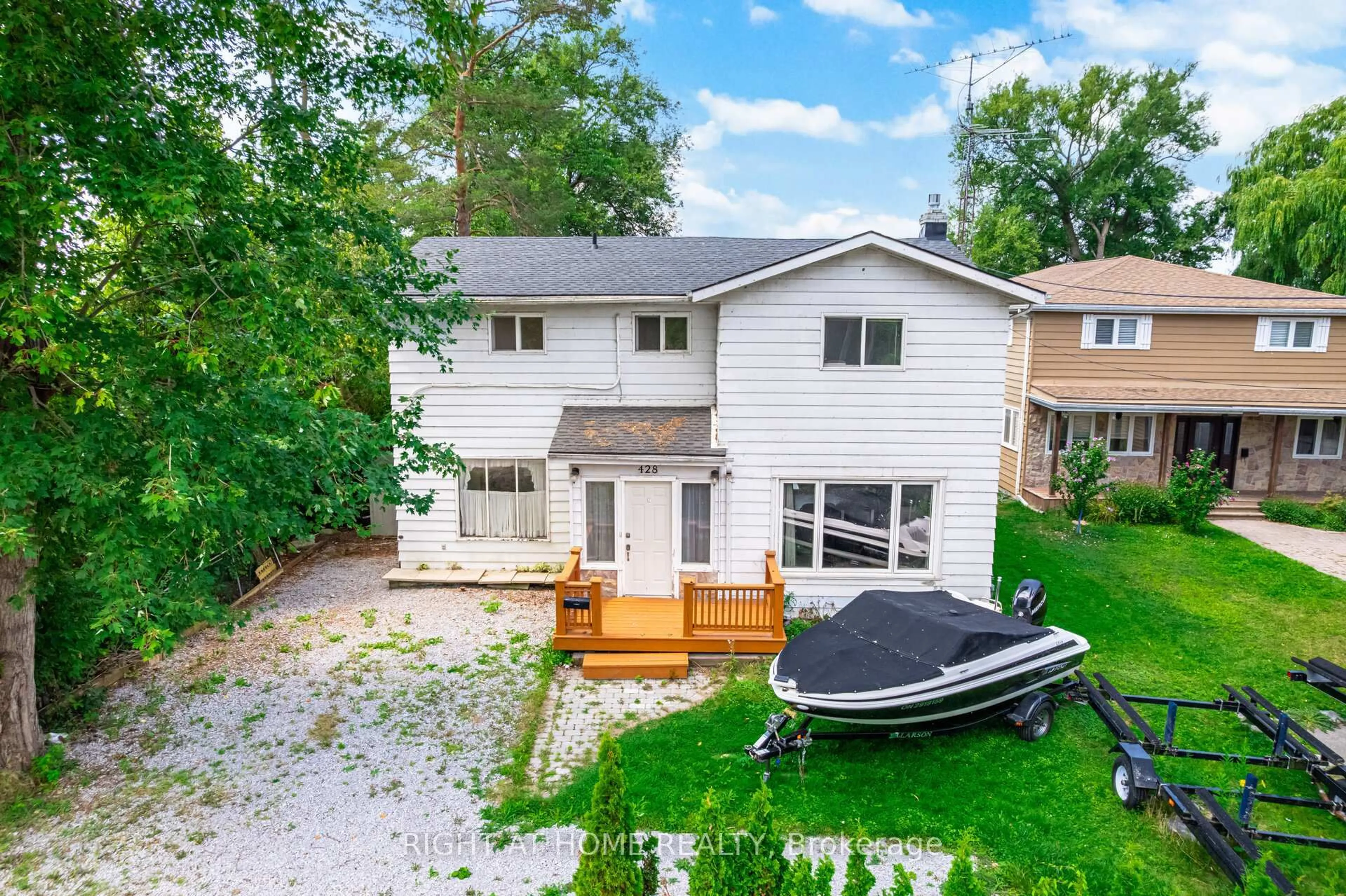 A pic from outside/outdoor area/front of a property/back of a property/a pic from drone, water/lake/river/ocean view for 428 Lake Dr, Georgina Ontario L4P 1P5