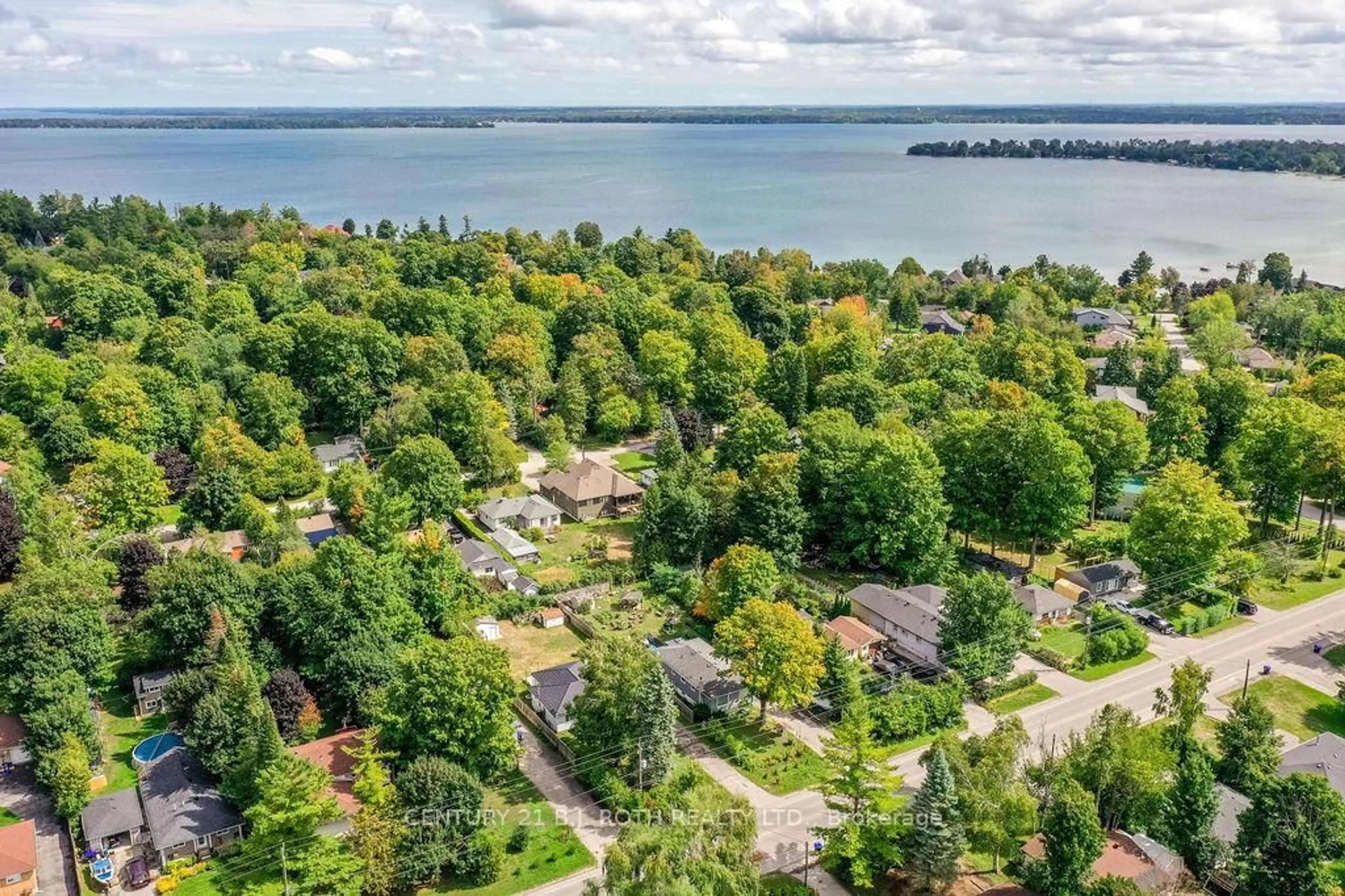 A pic from outside/outdoor area/front of a property/back of a property/a pic from drone, water/lake/river/ocean view for 2043 St Johns Rd, Innisfil Ontario L9S 1Y7