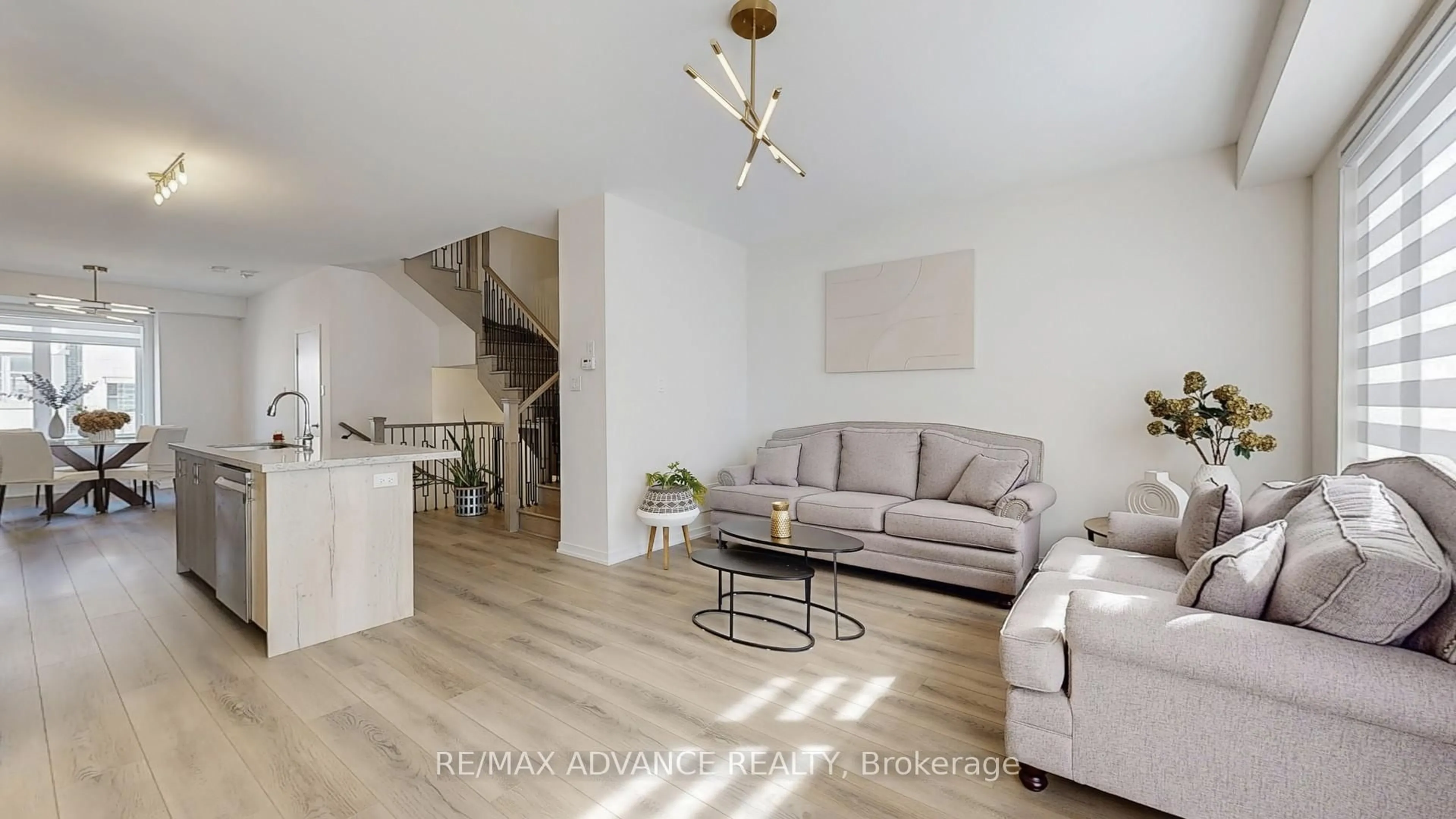 Living room with furniture, wood/laminate floor for 33 Origin Way, Vaughan Ontario L6A 4C2
