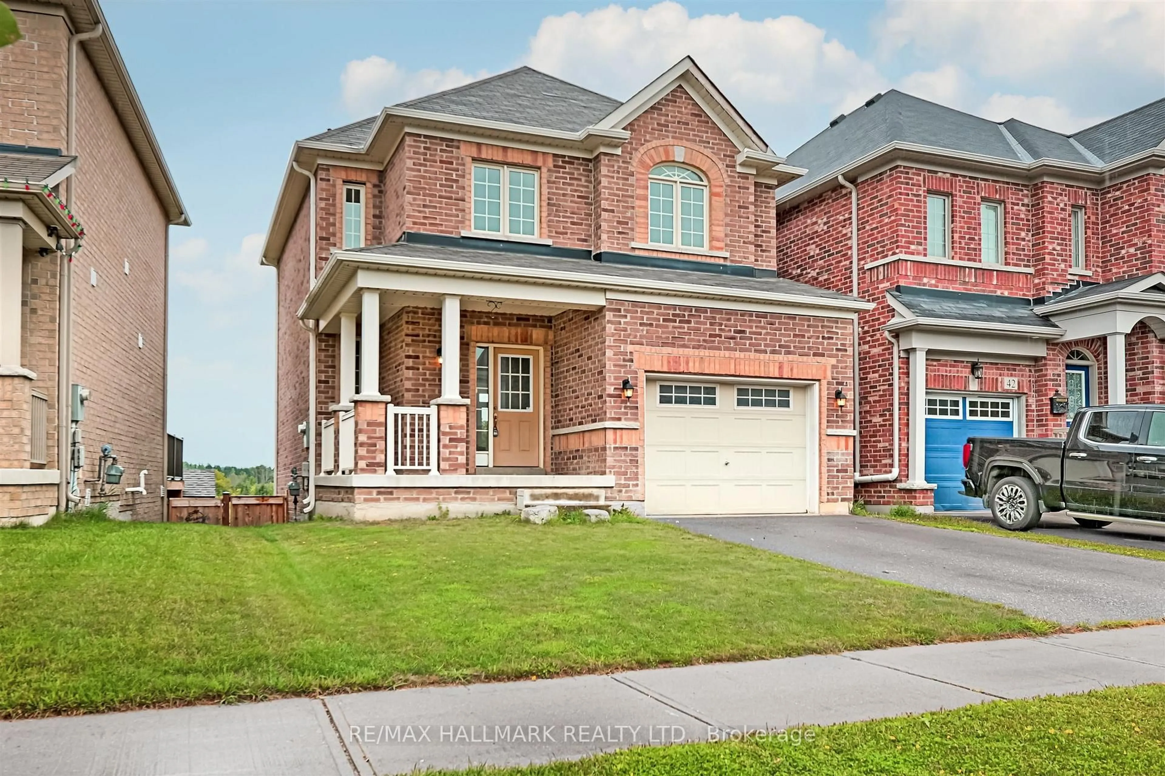 Home with brick exterior material, street for 44 Strachan Tr, New Tecumseth Ontario L0G 1A0