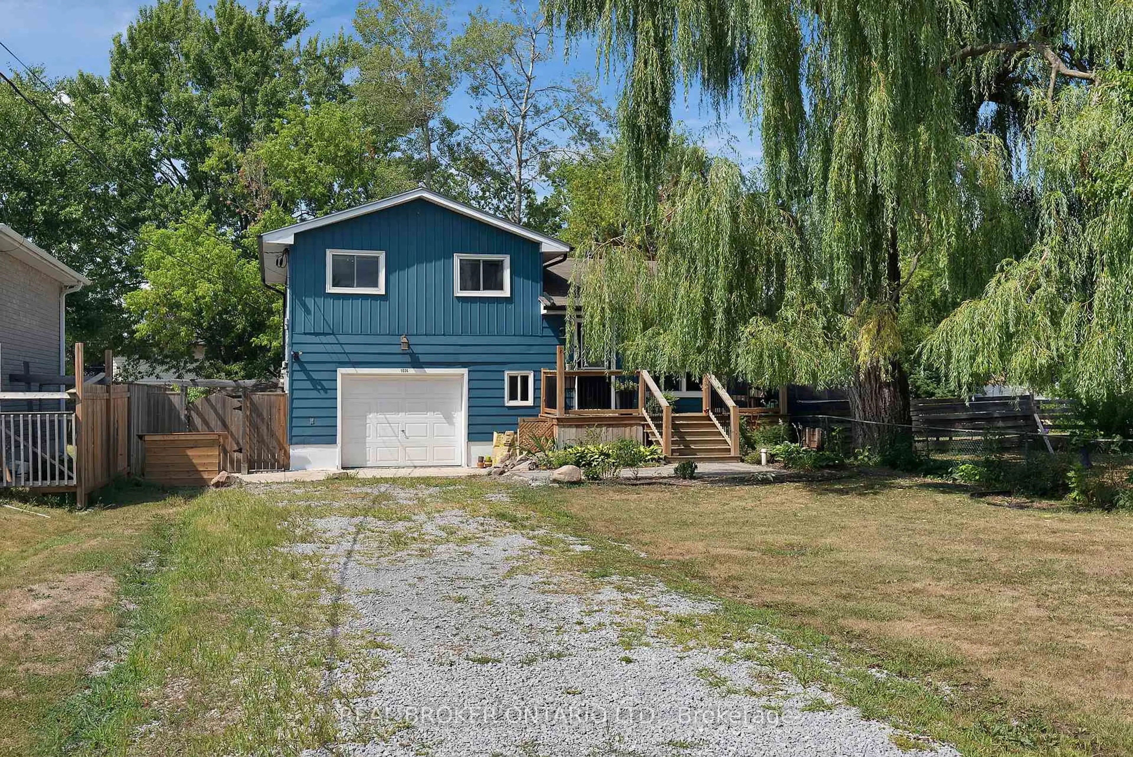 A pic from outside/outdoor area/front of a property/back of a property/a pic from drone, water/lake/river/ocean view for 1036 Metro Rd, Georgina Ontario L4P 3E9