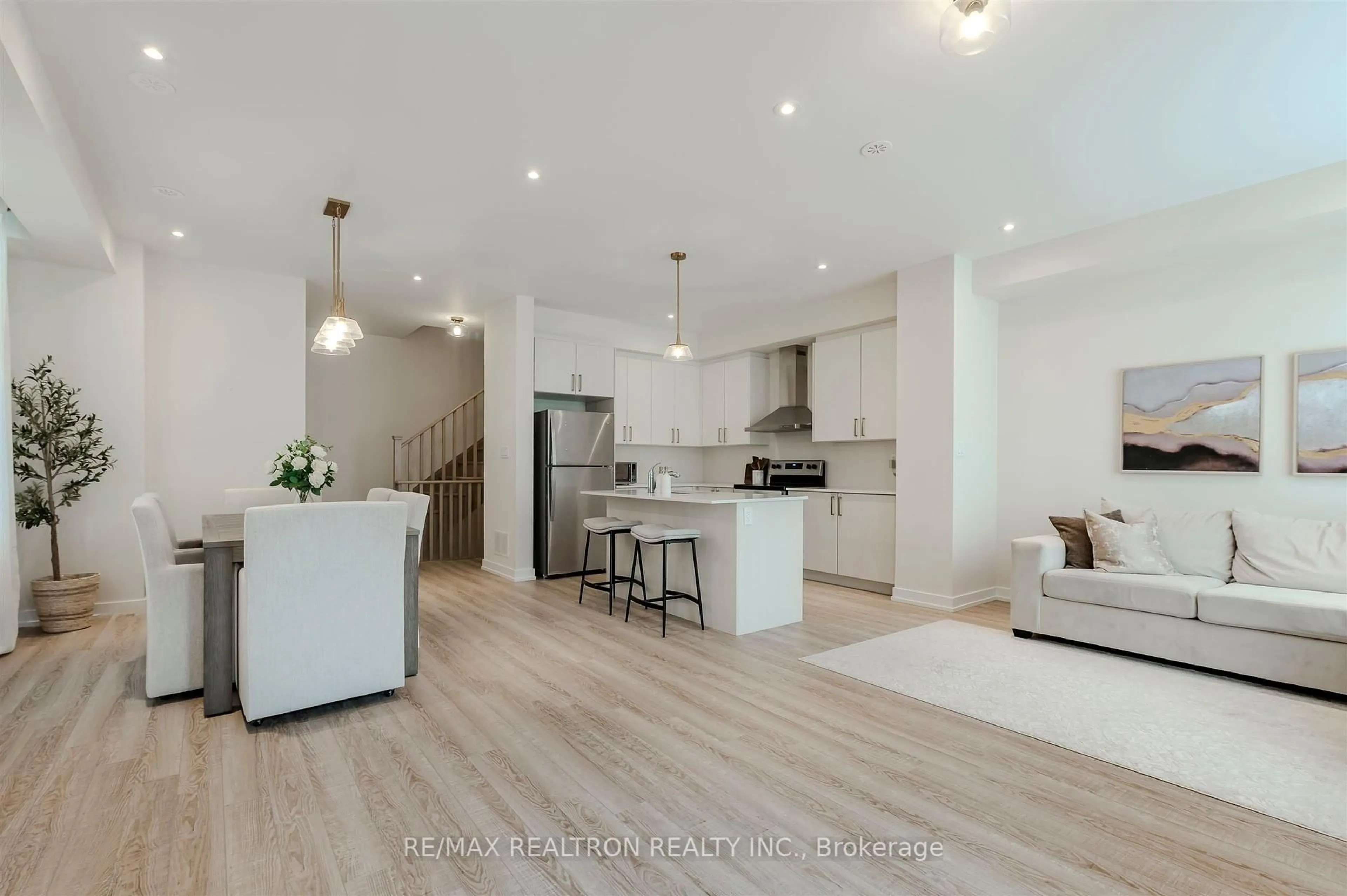 Open concept kitchen, wood/laminate floor for 41 Chiffon St, Vaughan Ontario L4L 0M6