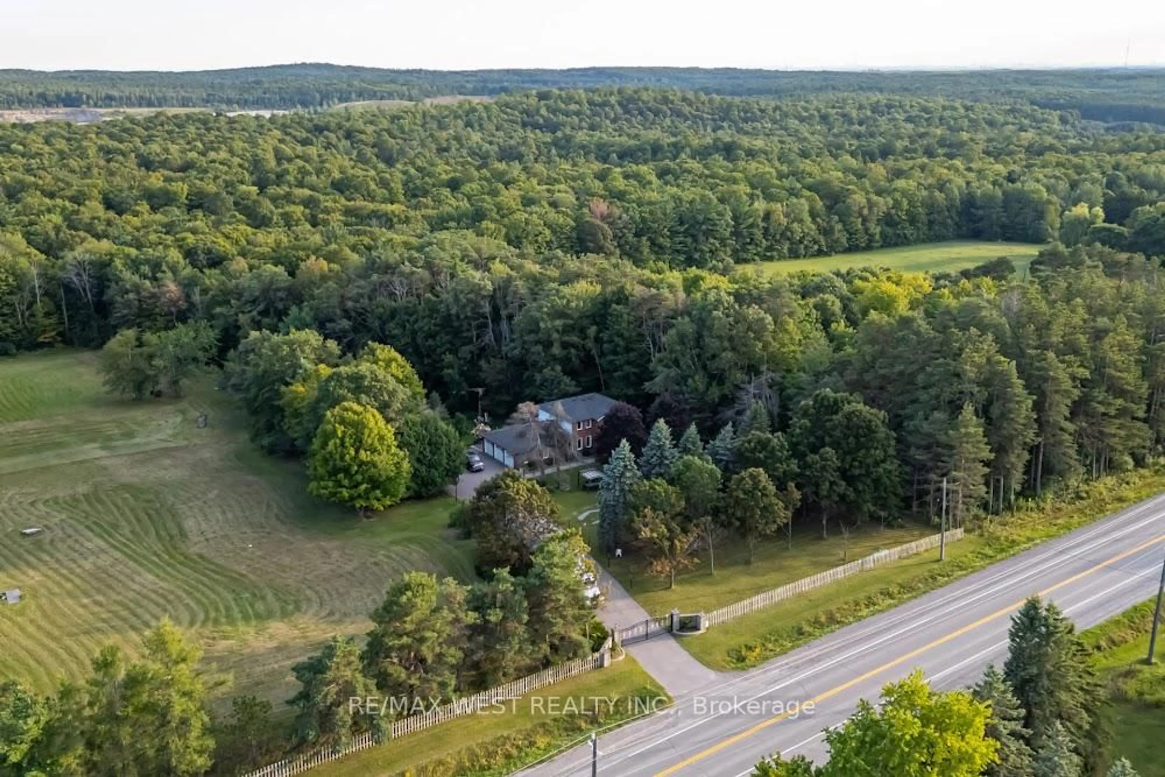 A pic from outside/outdoor area/front of a property/back of a property/a pic from drone, forest/trees view for 661 Regional Rd #21, Uxbridge Ontario L9L 1B5