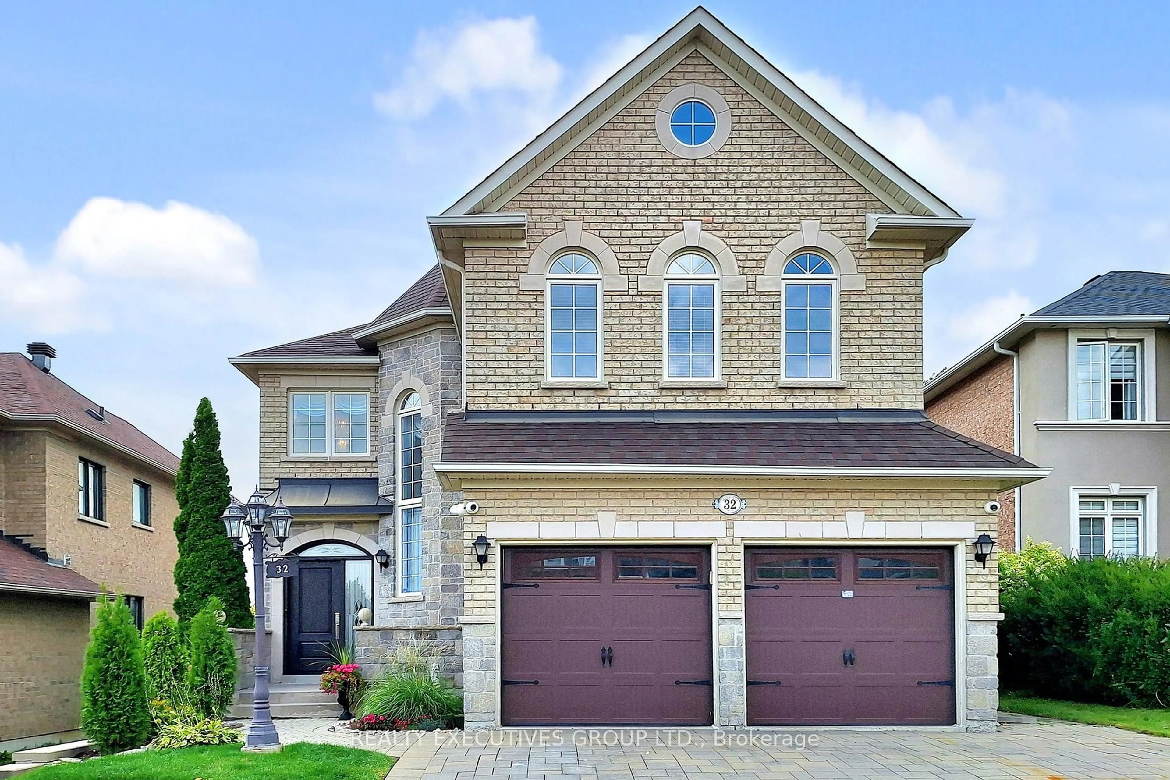 Home with brick exterior material, street for 32 Shadow Falls Dr, Richmond Hill Ontario L4E 4J7