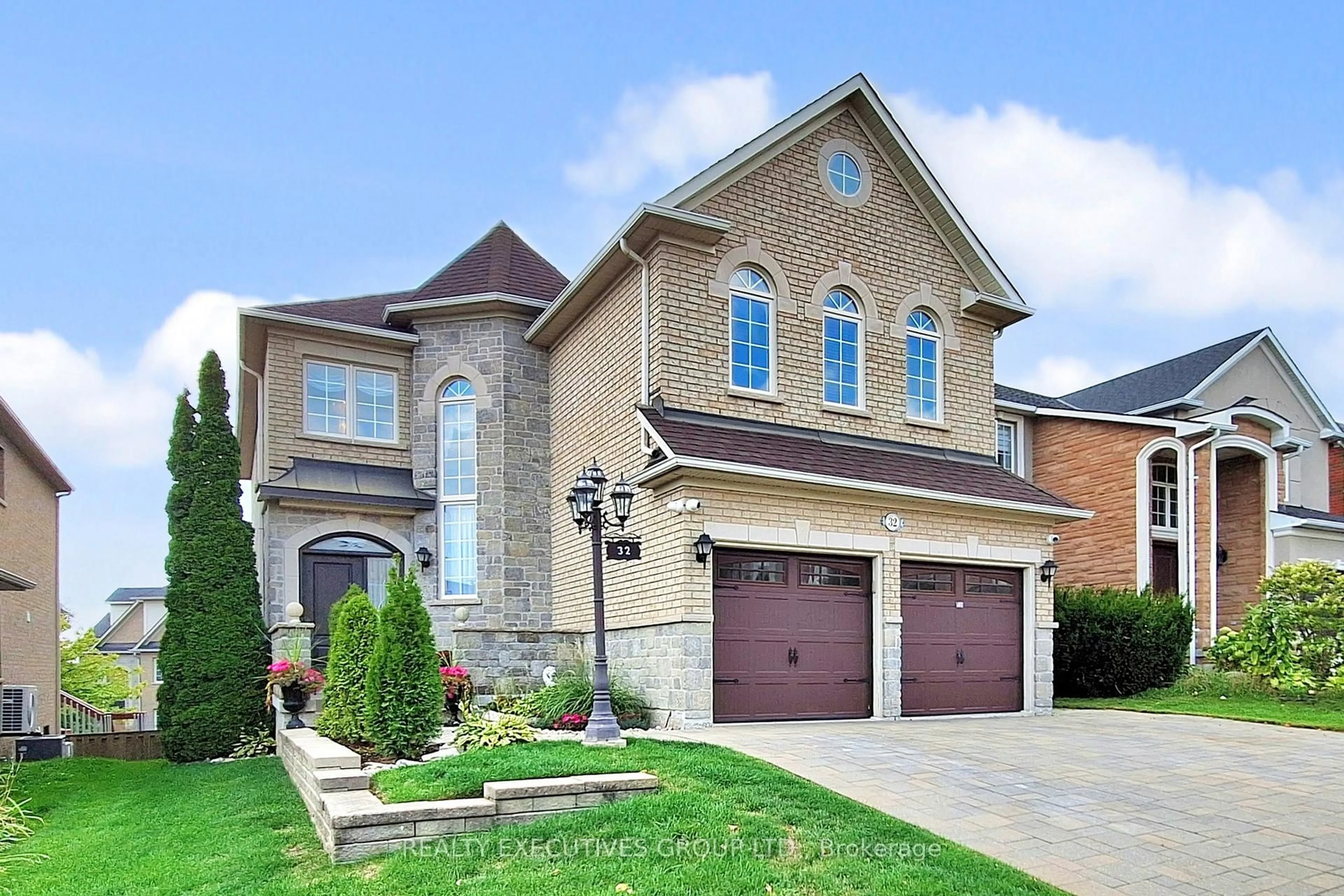 Home with brick exterior material, street for 32 Shadow Falls Dr, Richmond Hill Ontario L4E 4J7