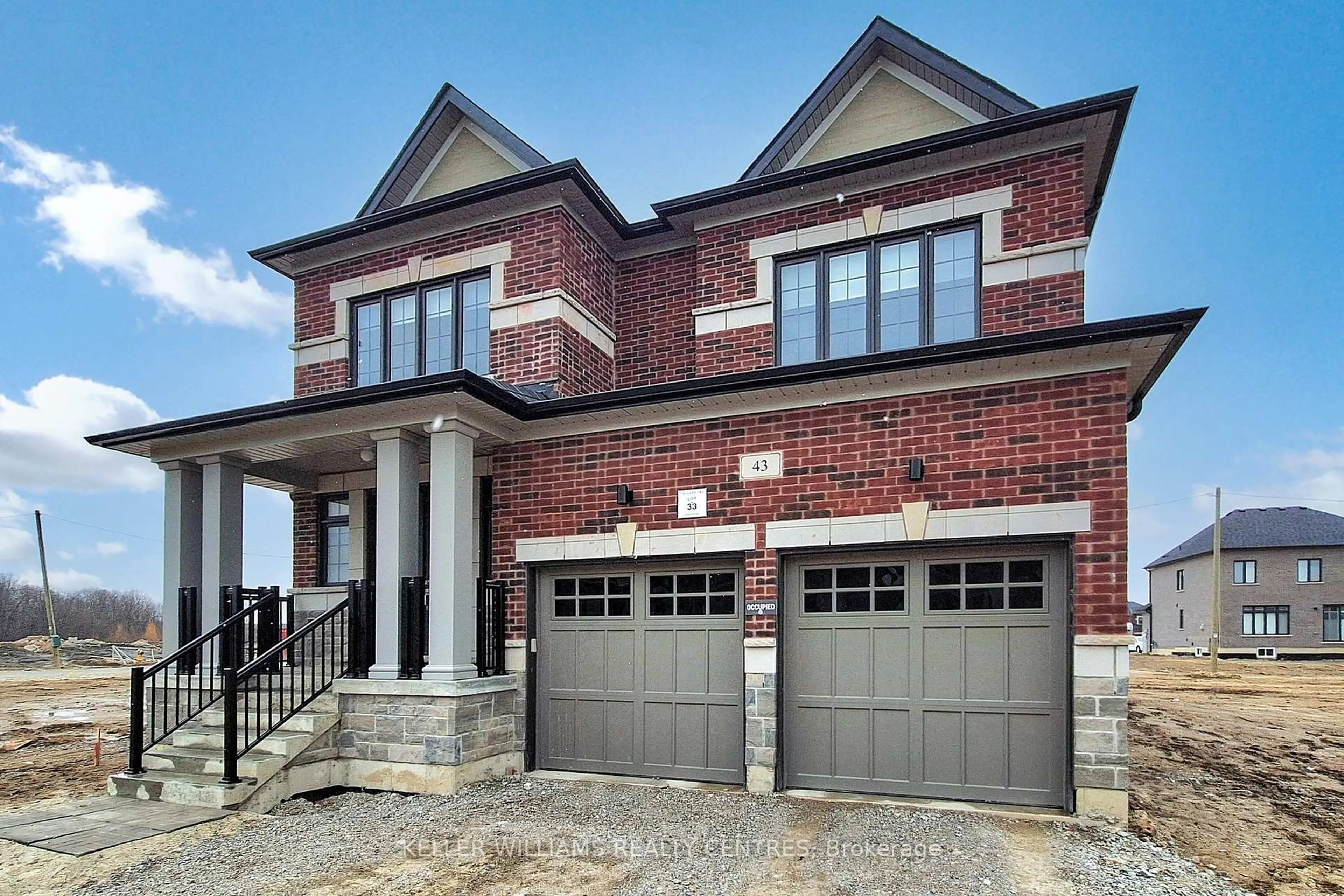 Home with brick exterior material, street for 43 Bud Willmot Way, King Ontario L7B 0S7