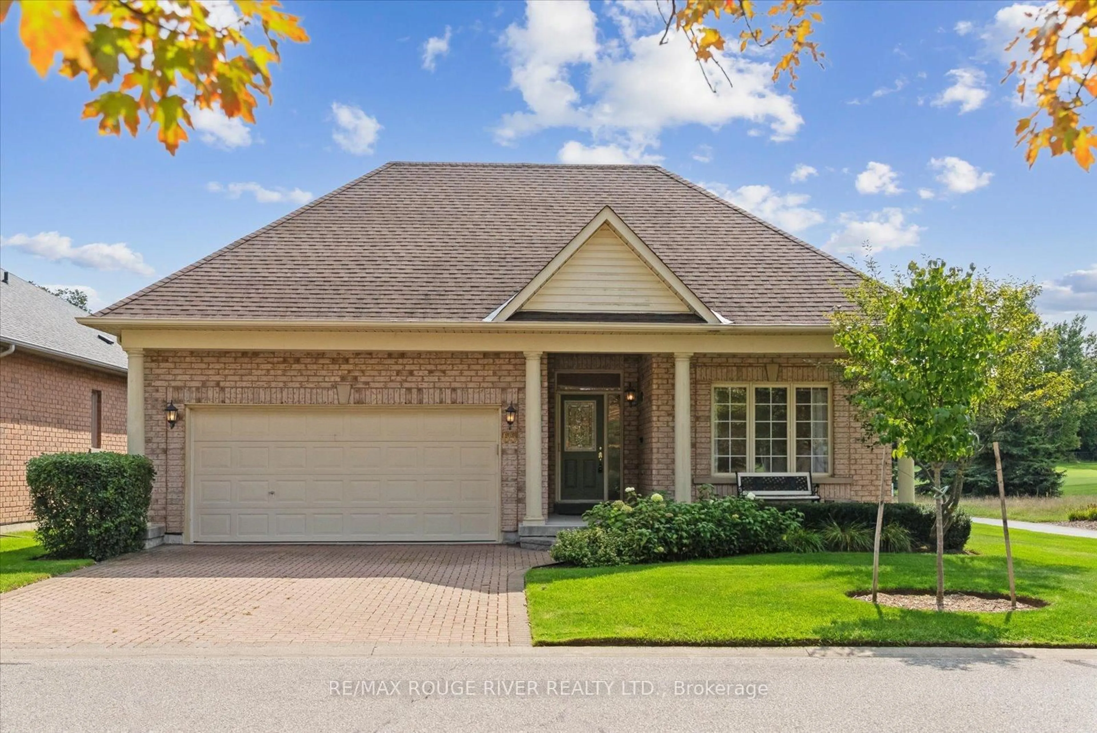 Home with brick exterior material, street for 65 Legendary Tr, Whitchurch-Stouffville Ontario L4A 1N6