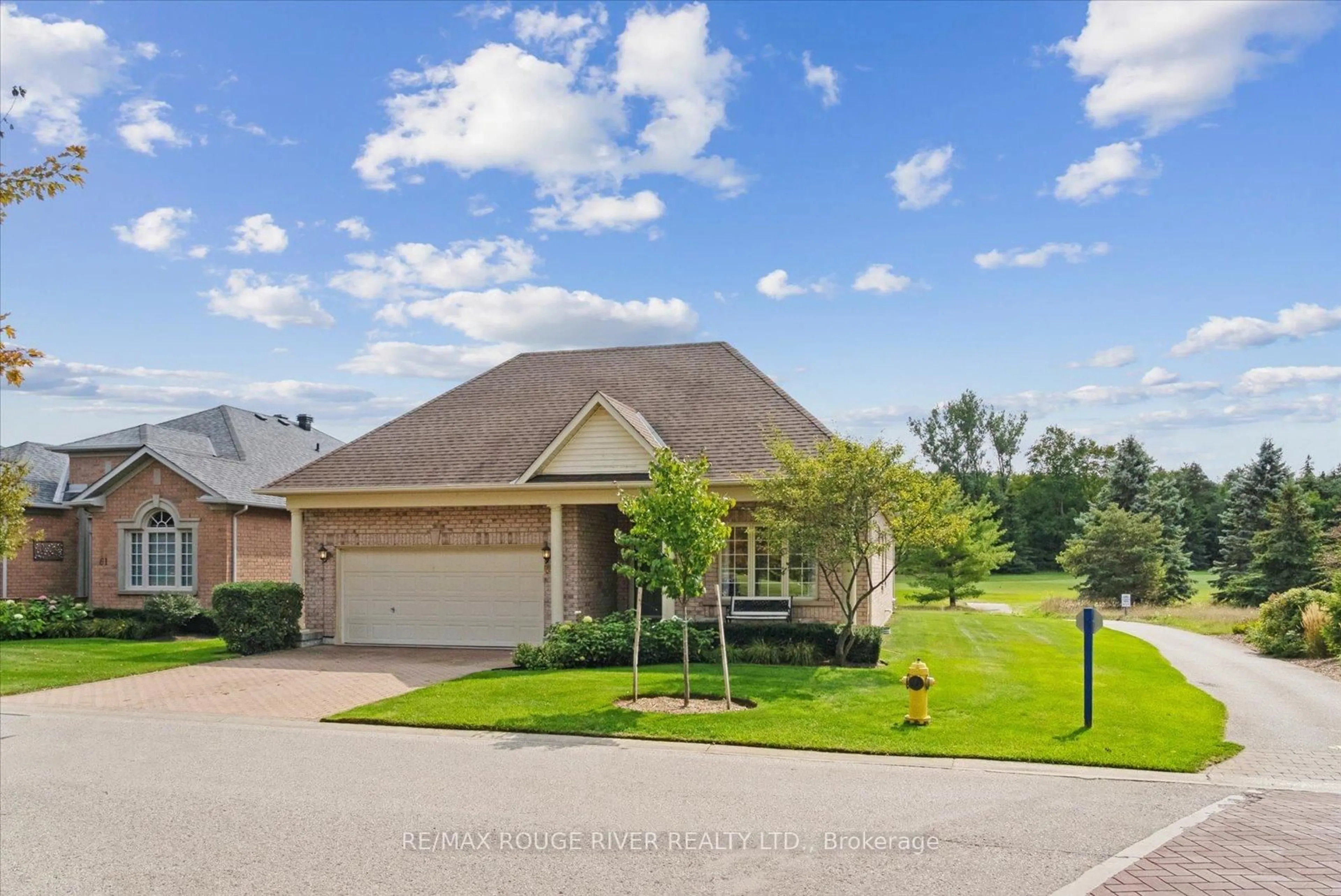 A pic from outside/outdoor area/front of a property/back of a property/a pic from drone, street for 65 Legendary Tr, Whitchurch-Stouffville Ontario L4A 1N6