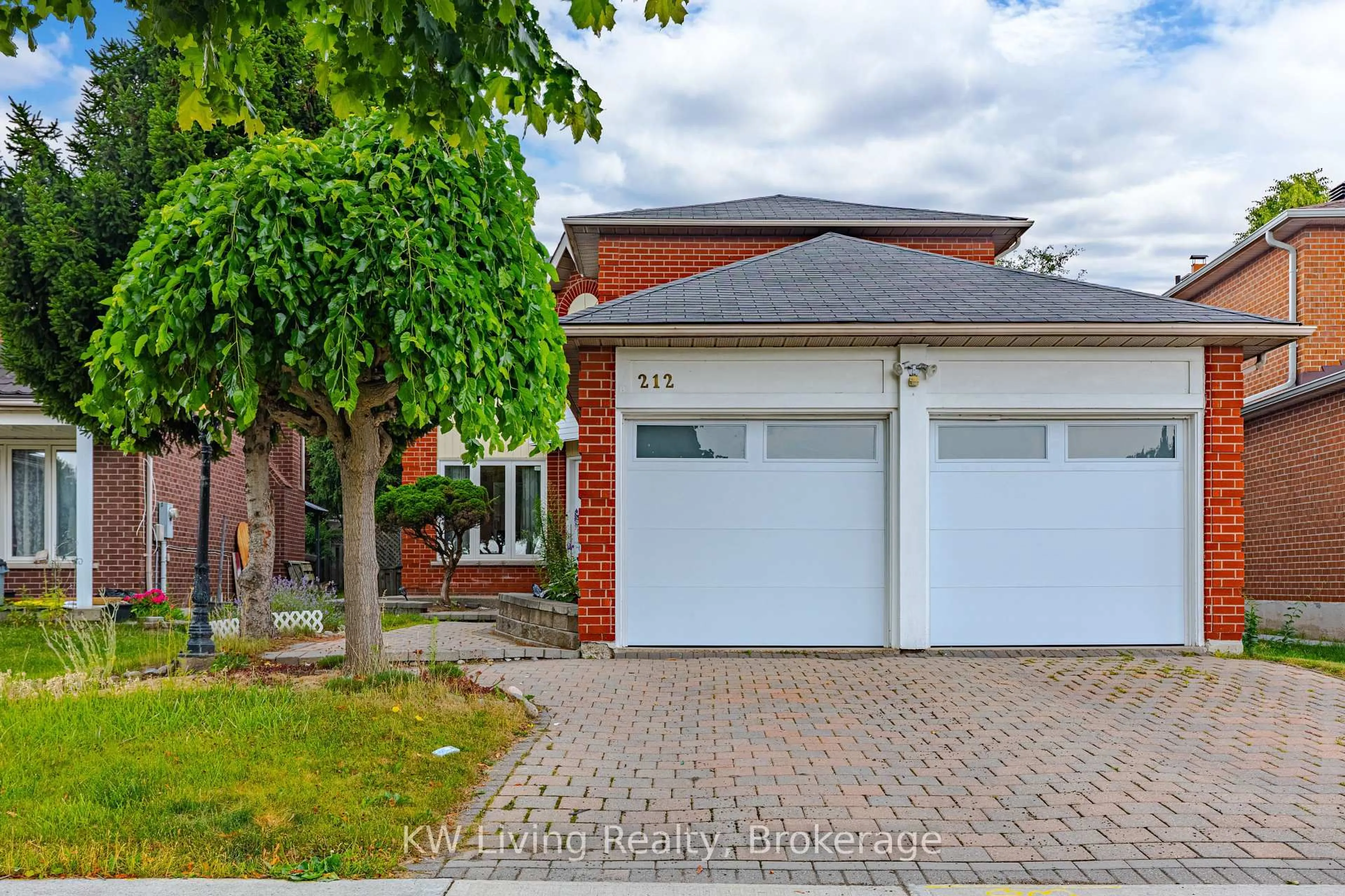 Home with brick exterior material, street for 212 Austin Dr, Markham Ontario L3R 6M6