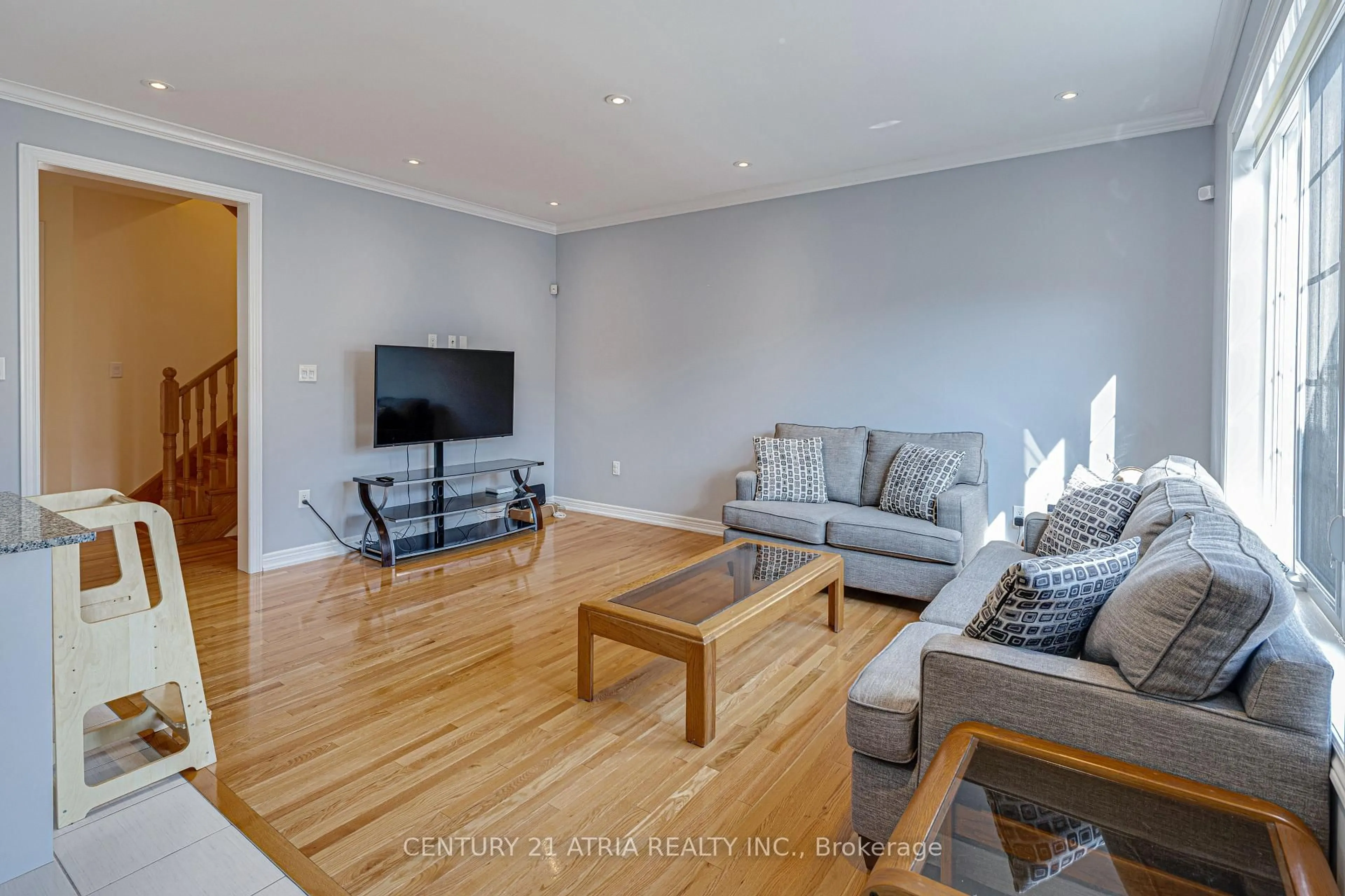 Living room with furniture, wood/laminate floor for 137 Barons St, Vaughan Ontario L4H 3Y7