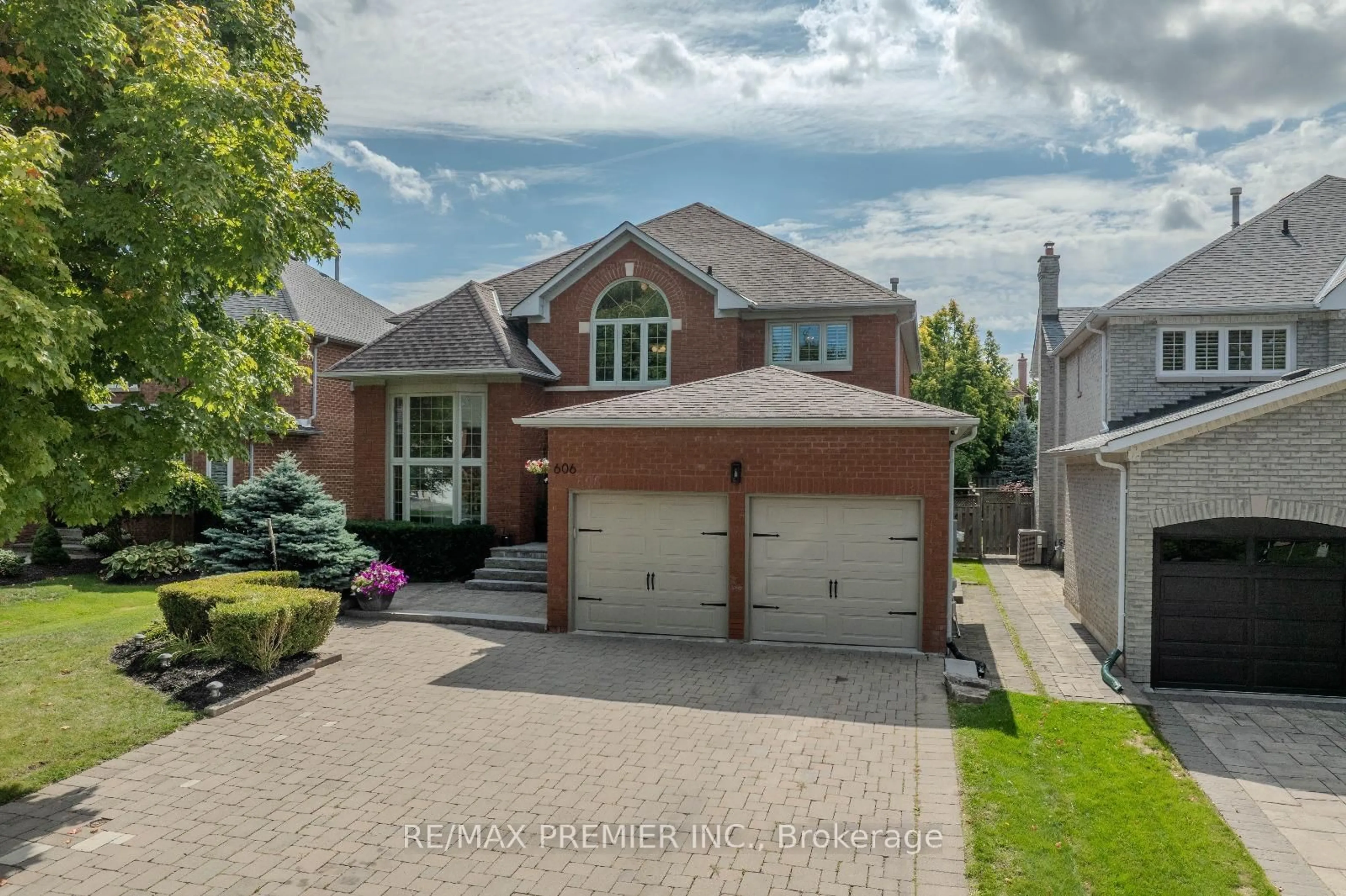 Home with brick exterior material, street for 606 Brooker Rdge, Newmarket Ontario L3X 1V7