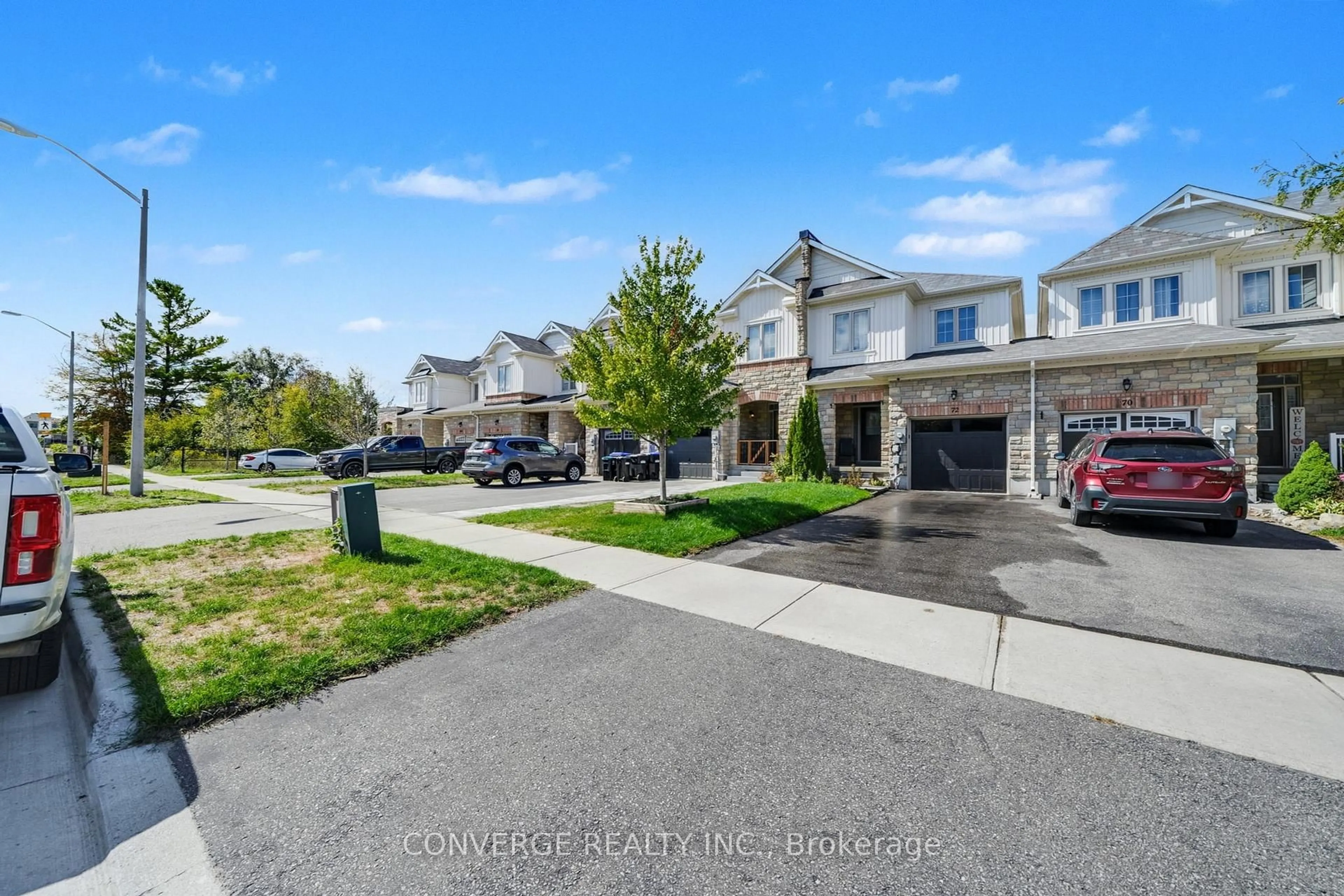 A pic from outside/outdoor area/front of a property/back of a property/a pic from drone, street for 72 Greenwood Dr, Essa Ontario L0M 1B5