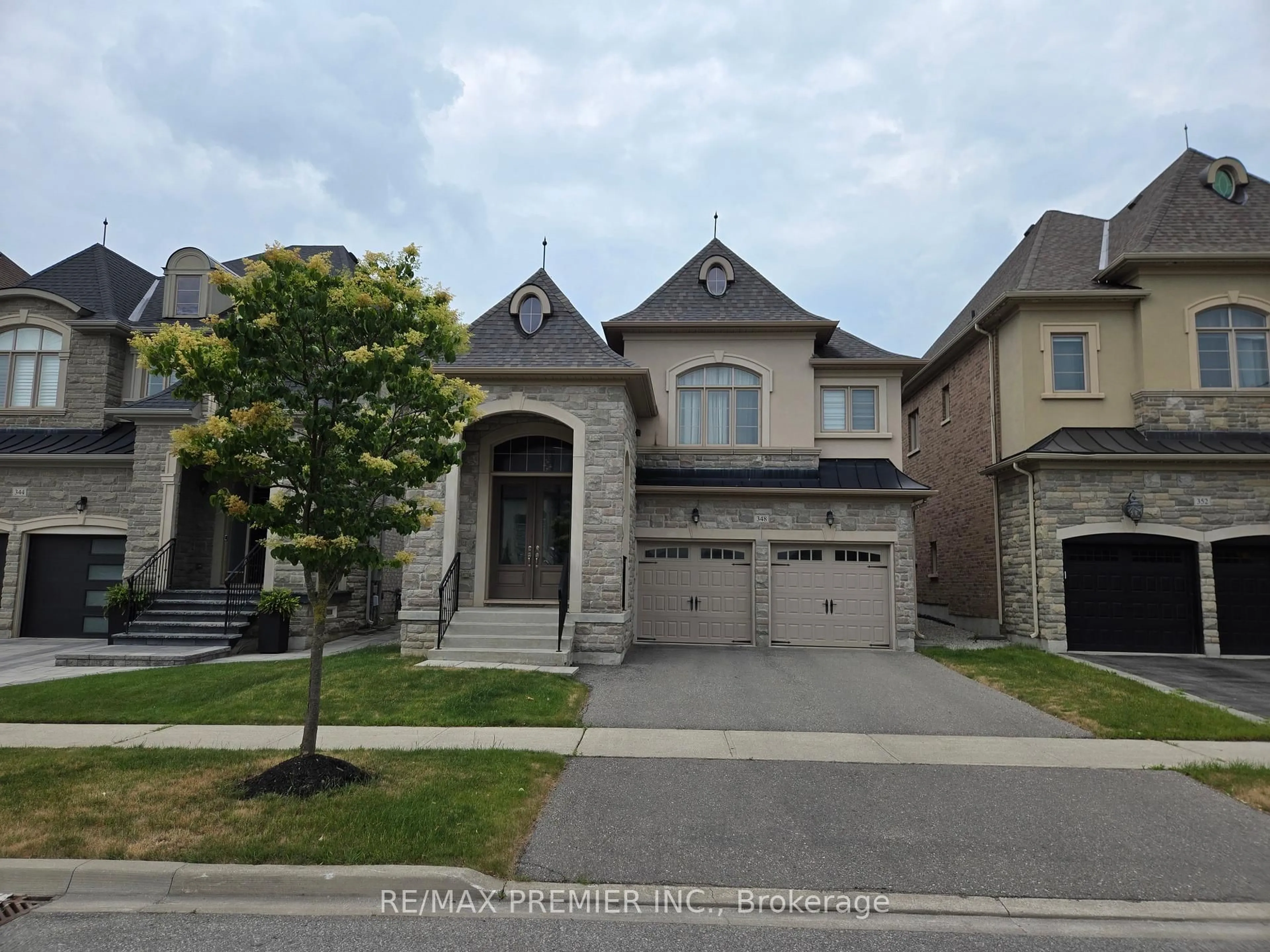 Home with brick exterior material, street for 348 Poetry Dr, Vaughan Ontario L4H 3W8