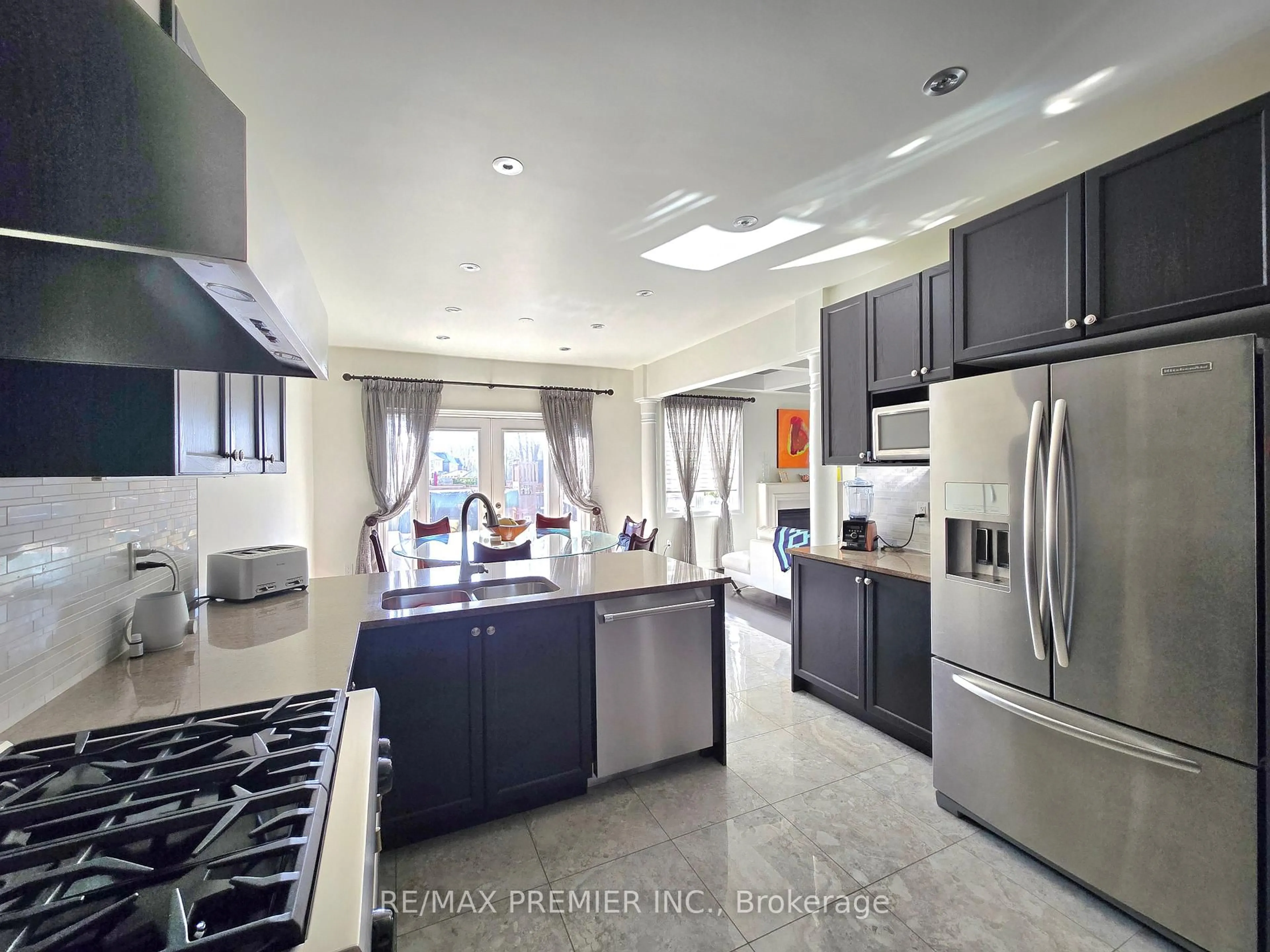Open concept kitchen, ceramic/tile floor for 348 Poetry Dr, Vaughan Ontario L4H 3W8