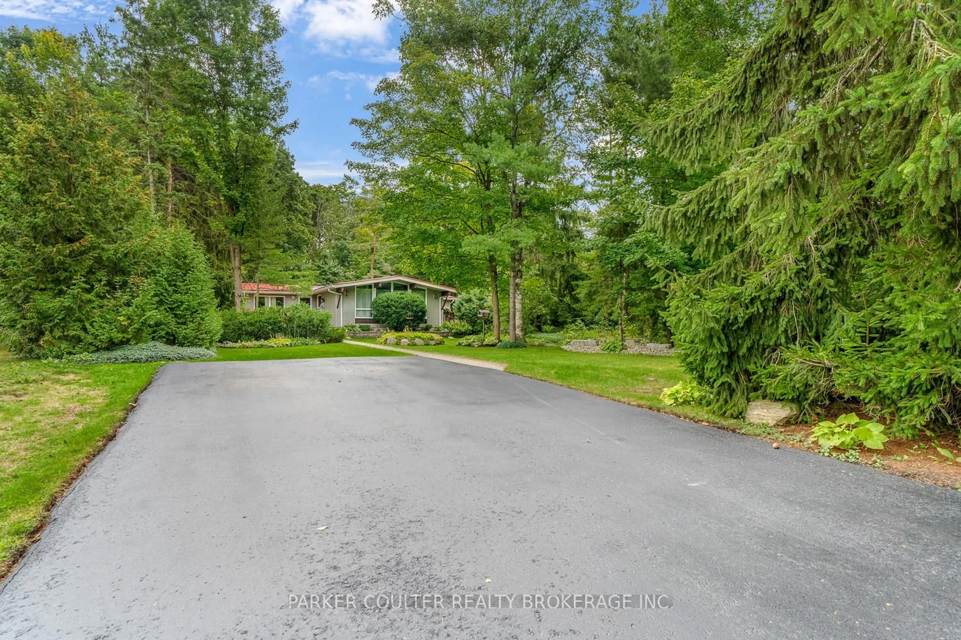 A pic from outside/outdoor area/front of a property/back of a property/a pic from drone, forest/trees view for 3759 Whitecap Dr, Innisfil Ontario L9S 2L4