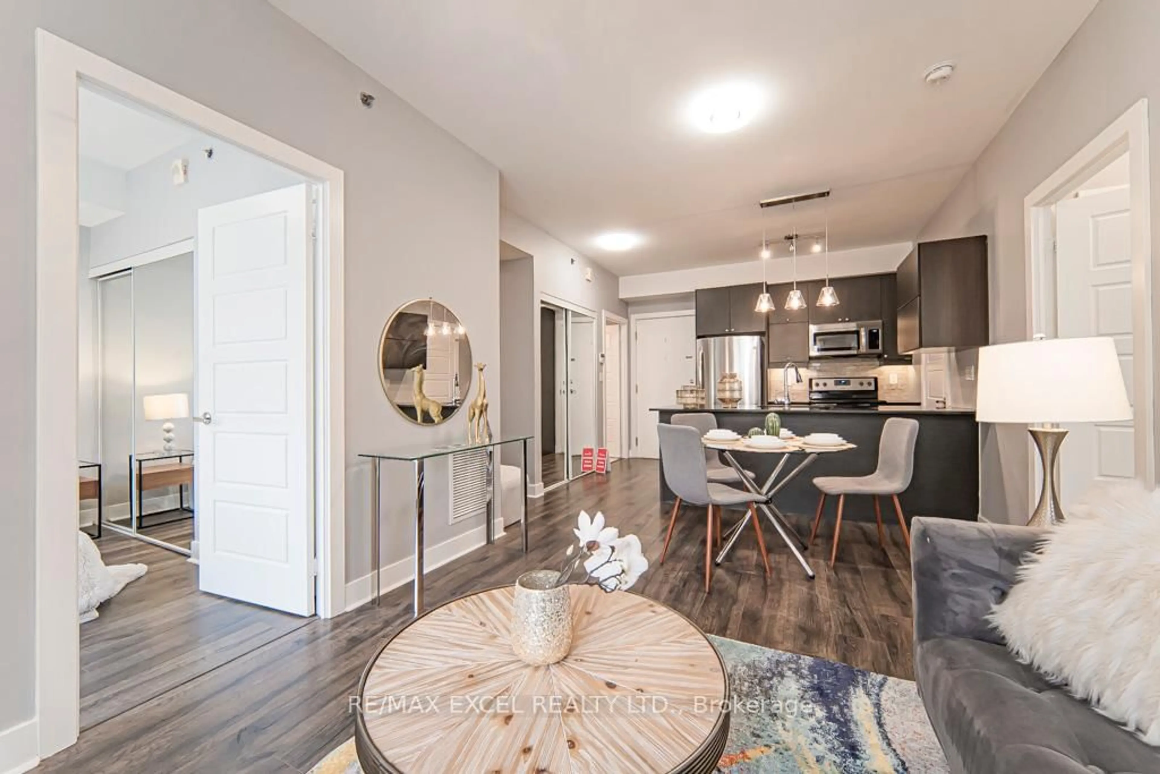 Open concept kitchen, wood/laminate floor for 28 Prince Regent St #244, Markham Ontario L6C 0V5