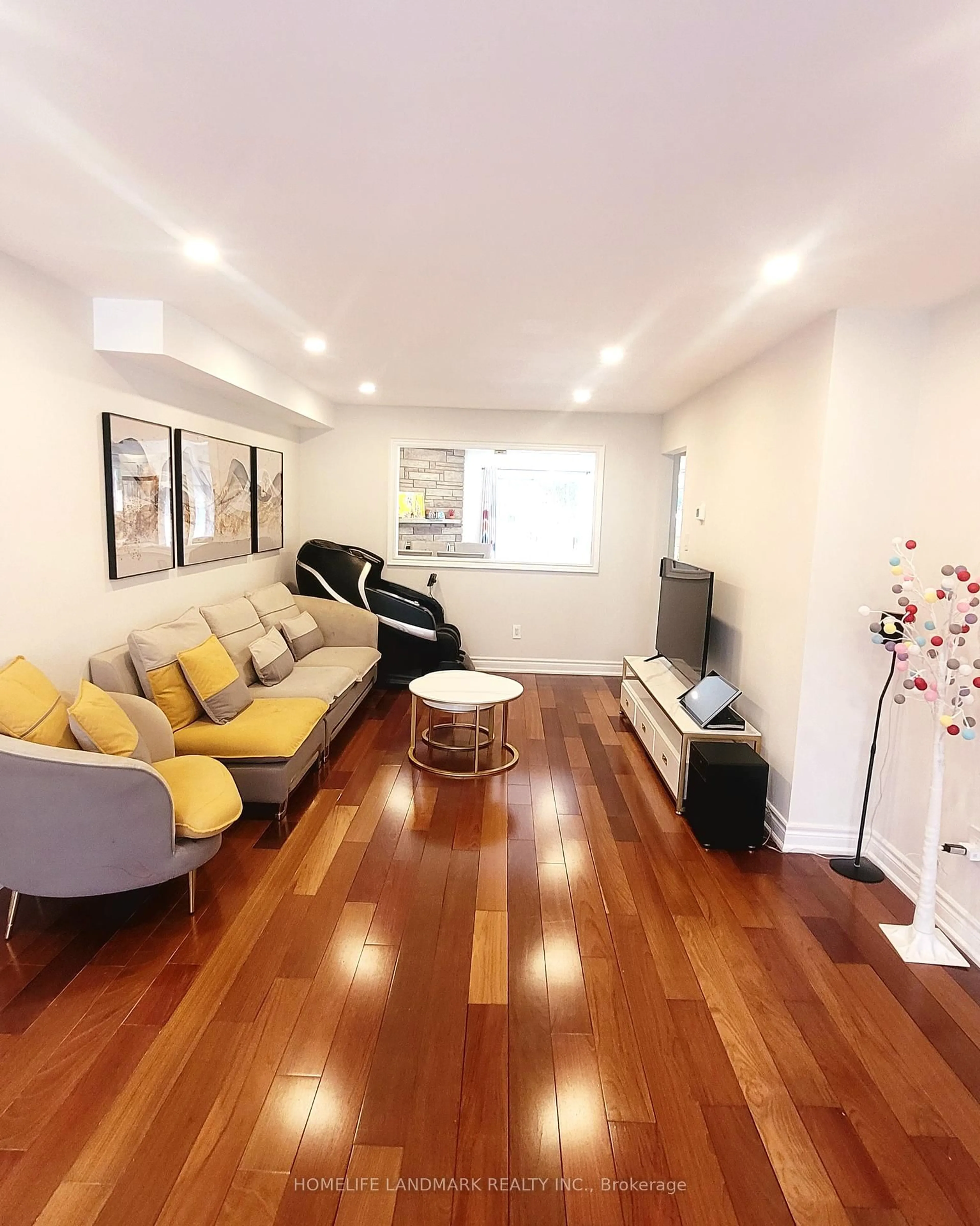 Living room with furniture, wood/laminate floor for 2 Marion Cres, Markham Ontario L3P 6E8