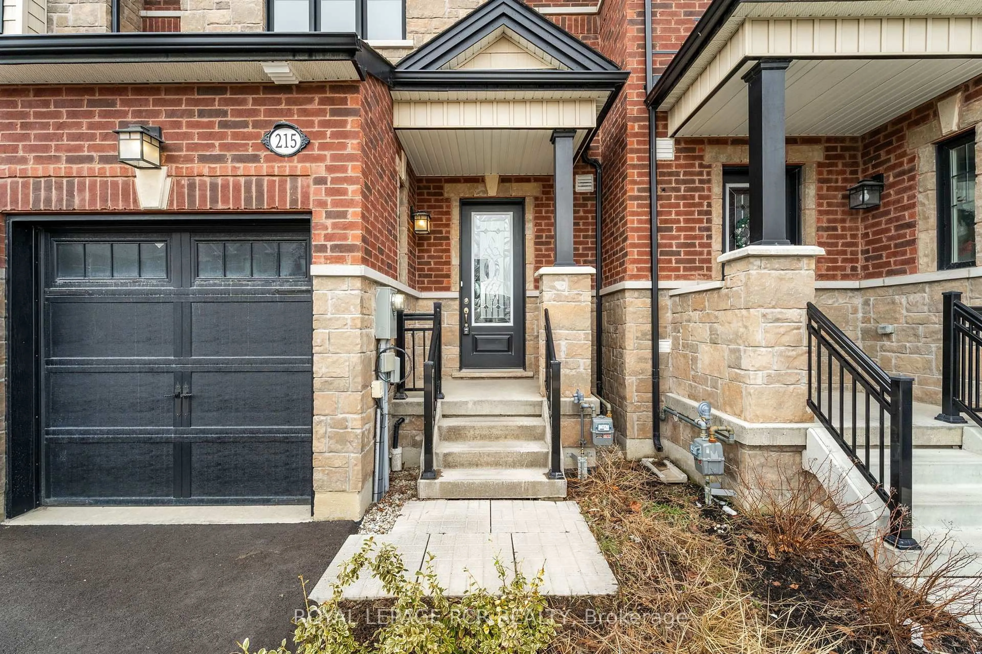 Home with brick exterior material, street for 215 Walker Blvd, New Tecumseth Ontario L9R 0R2