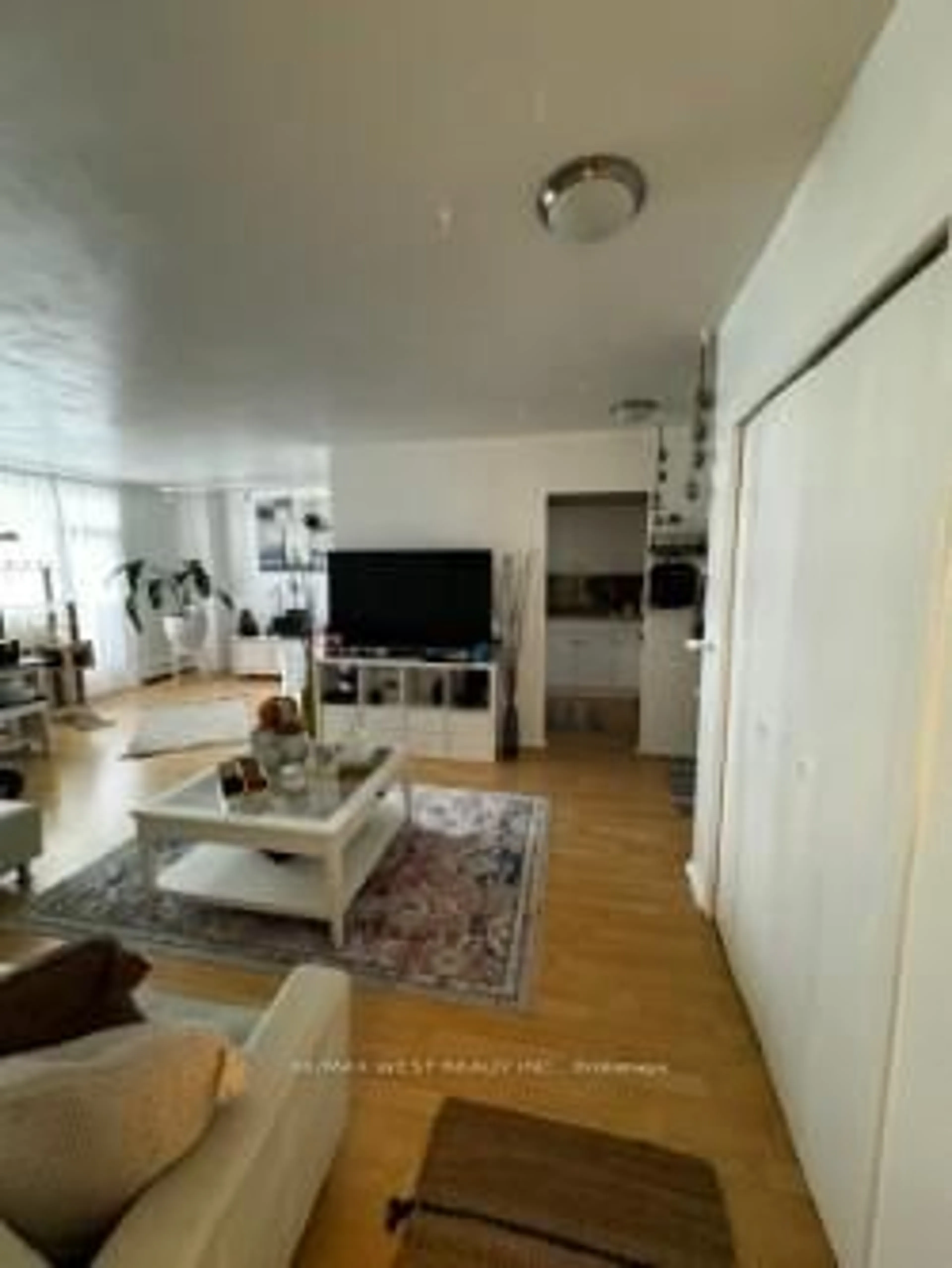 Living room with furniture, floor is not visible for 67 Richmond St #507, Richmond Hill Ontario L4C 3Y3