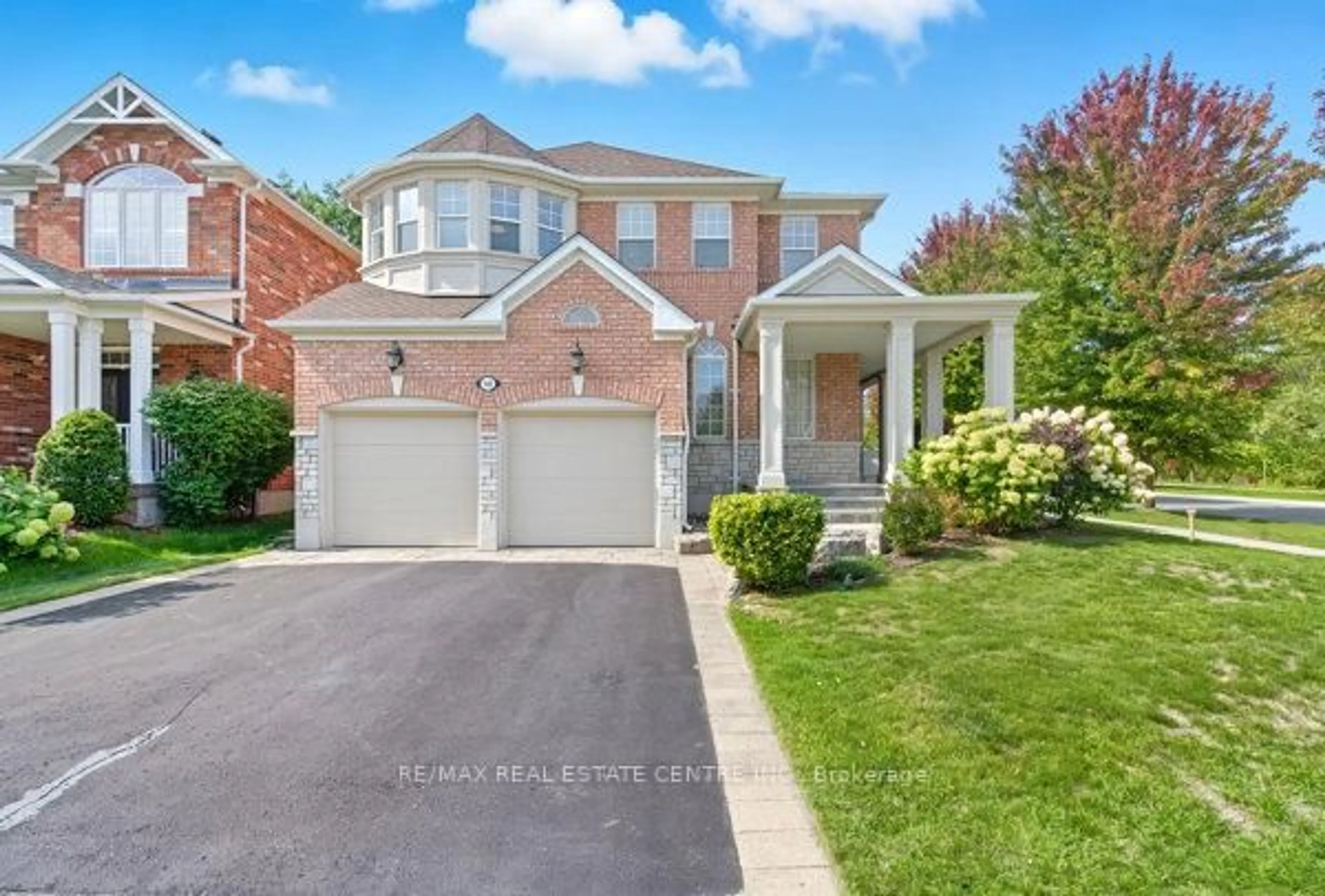 Home with brick exterior material, street for 122 Wood Rim Dr, Richmond Hill Ontario L4E 4N8