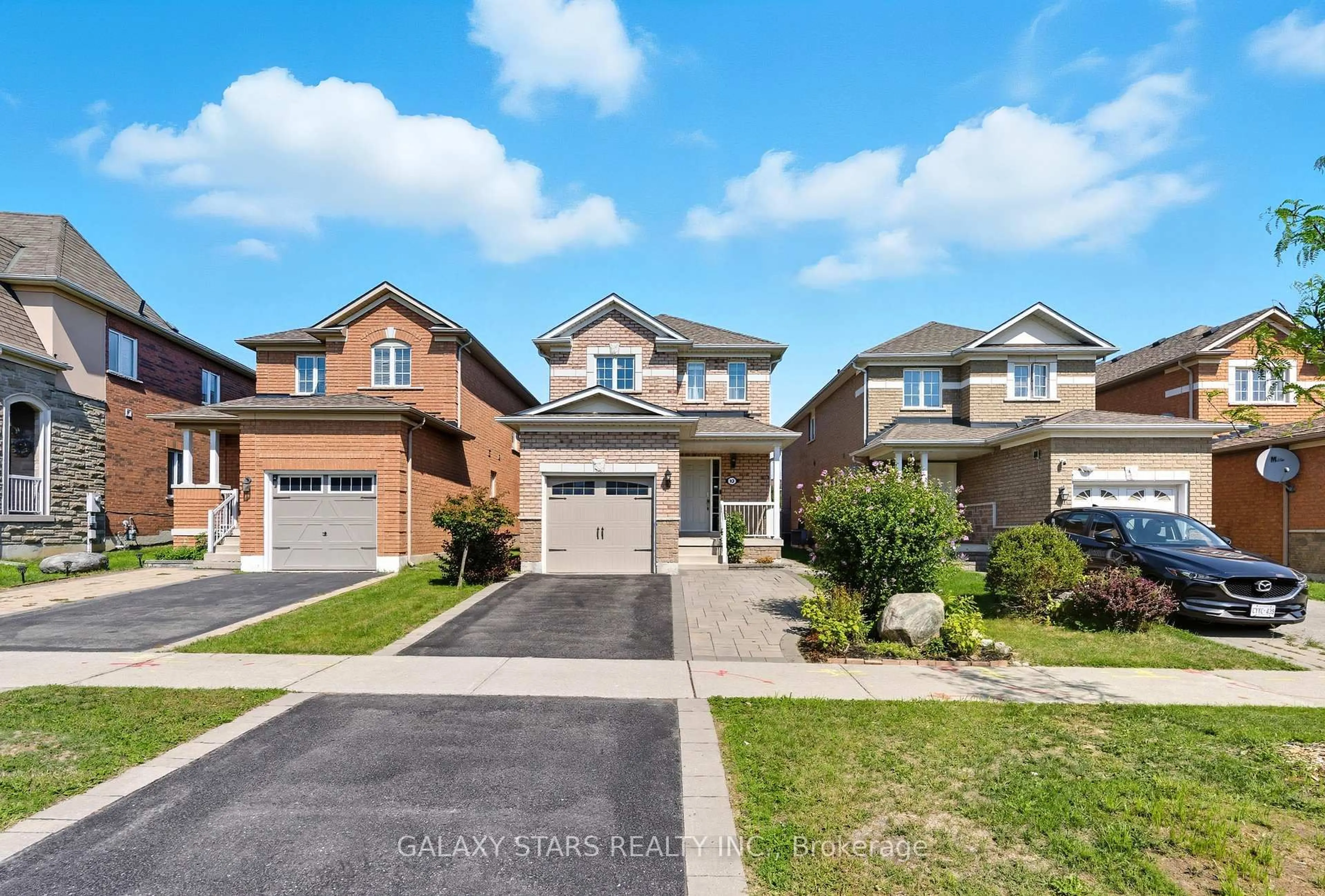 Home with brick exterior material, street for 12 Primont Dr, Richmond Hill Ontario L4S 2V5
