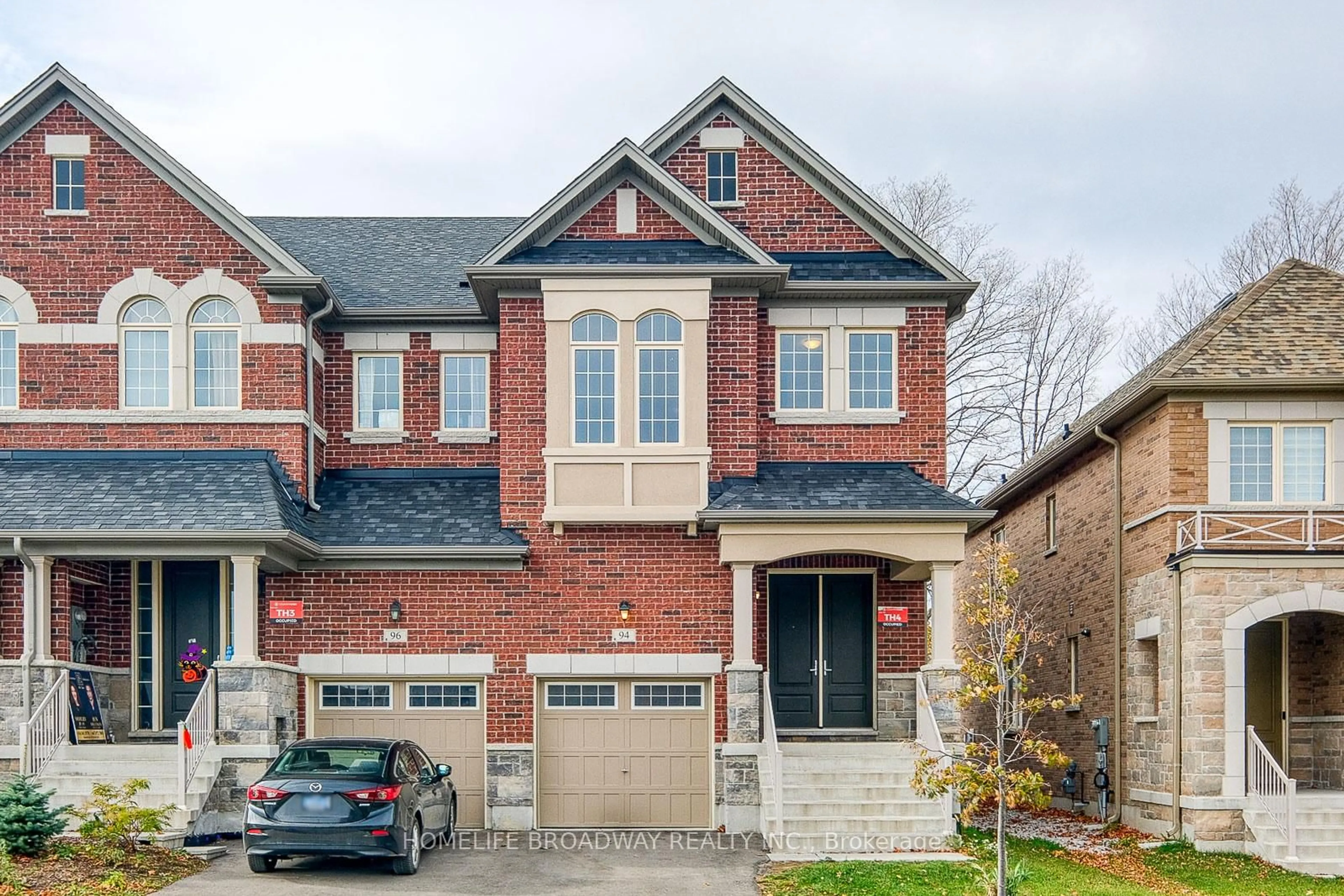 Home with brick exterior material, street for 94 Drizzel Cres, Richmond Hill Ontario L4E 2Z1