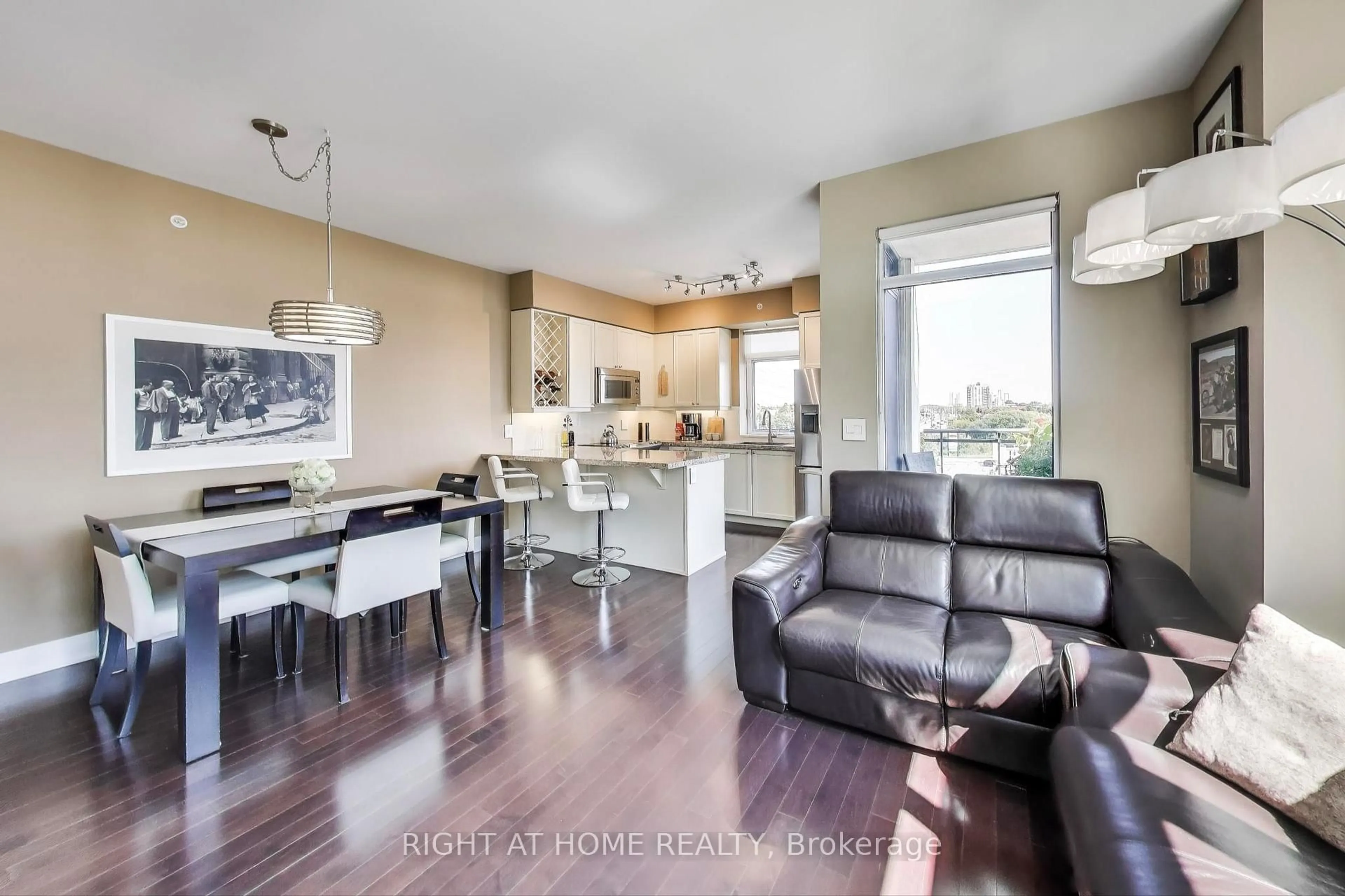 Open concept kitchen, wood/laminate floor for 12 Woodstream Blvd #317, Vaughan Ontario L4L 8C3