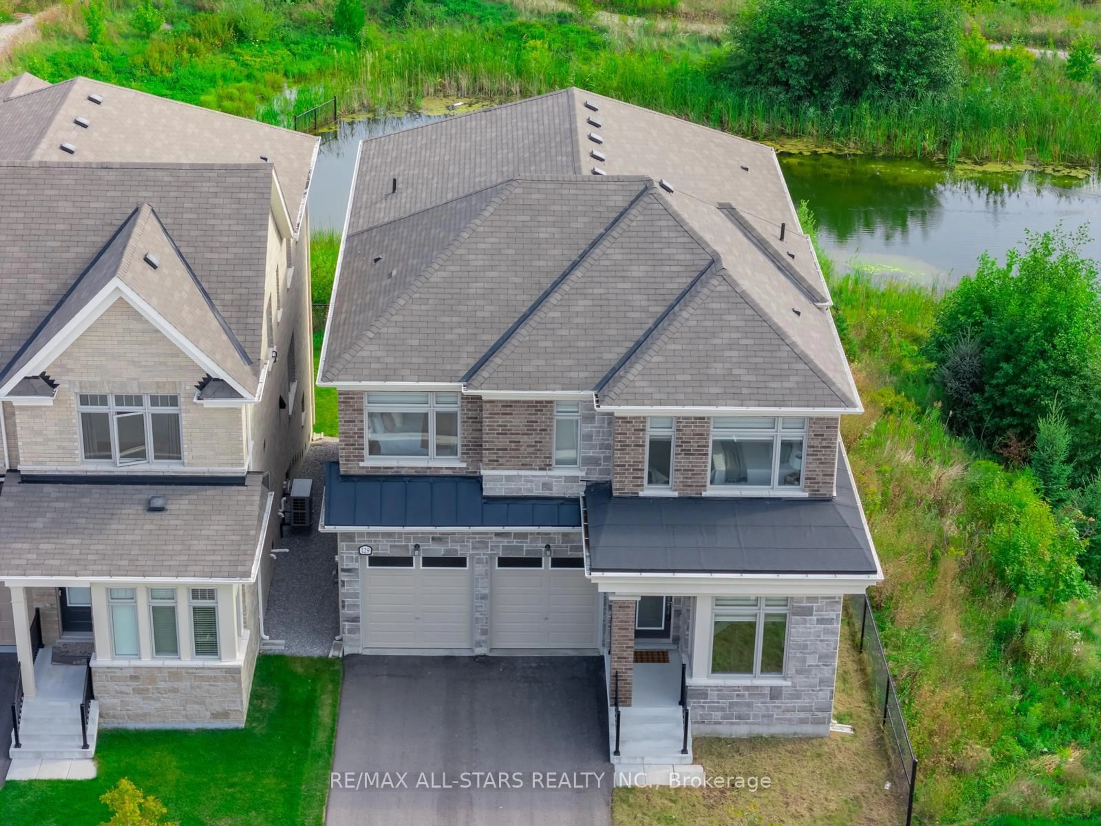A pic from outside/outdoor area/front of a property/back of a property/a pic from drone, unknown for 129 Busato Dr, Whitchurch-Stouffville Ontario L4A 4V6